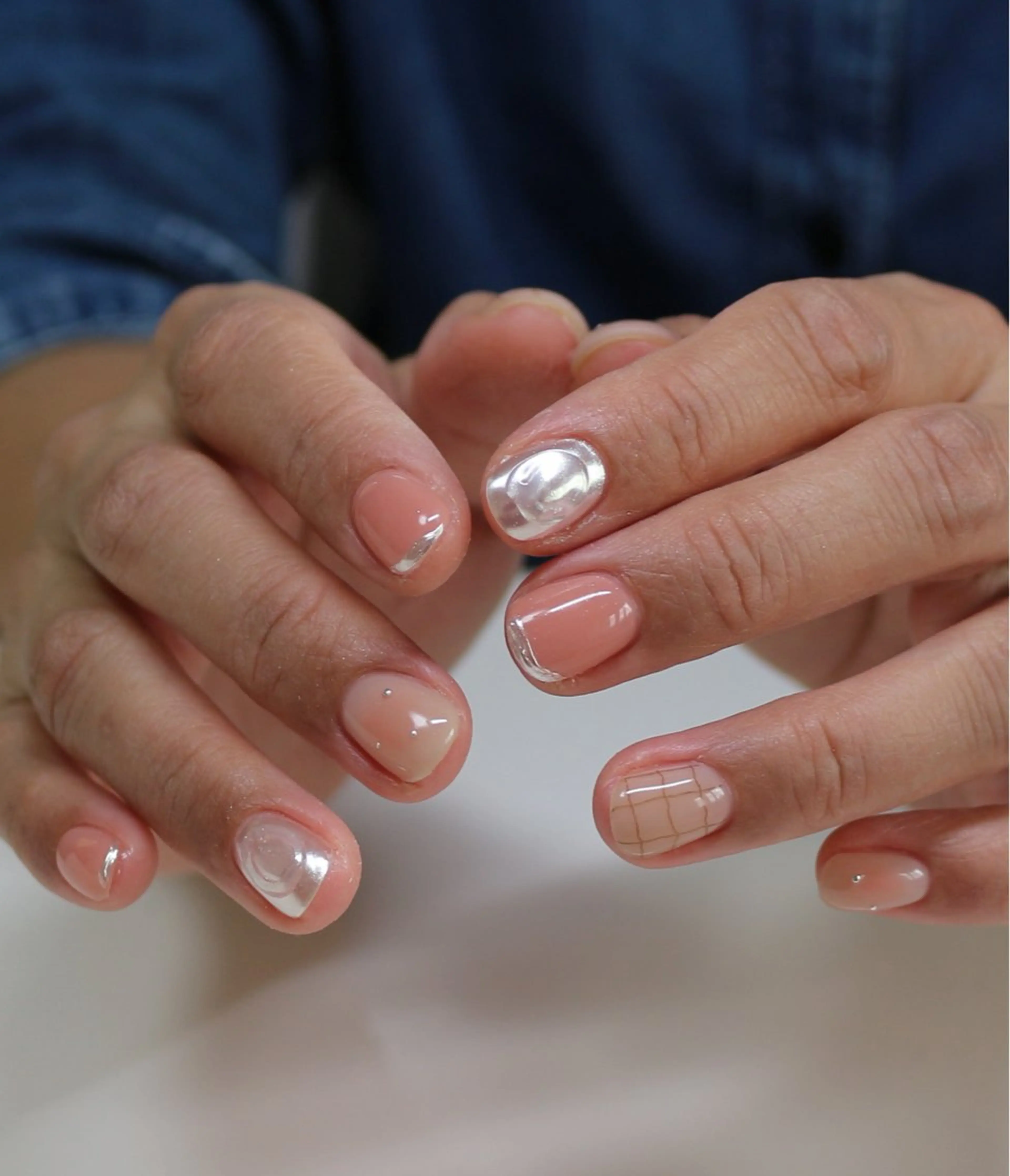 ネイル チークネイル ミラーネイル ニュアンスネイル オレンジ 春ネイル ハンドネイル Baku Nailsのネイルデザイン