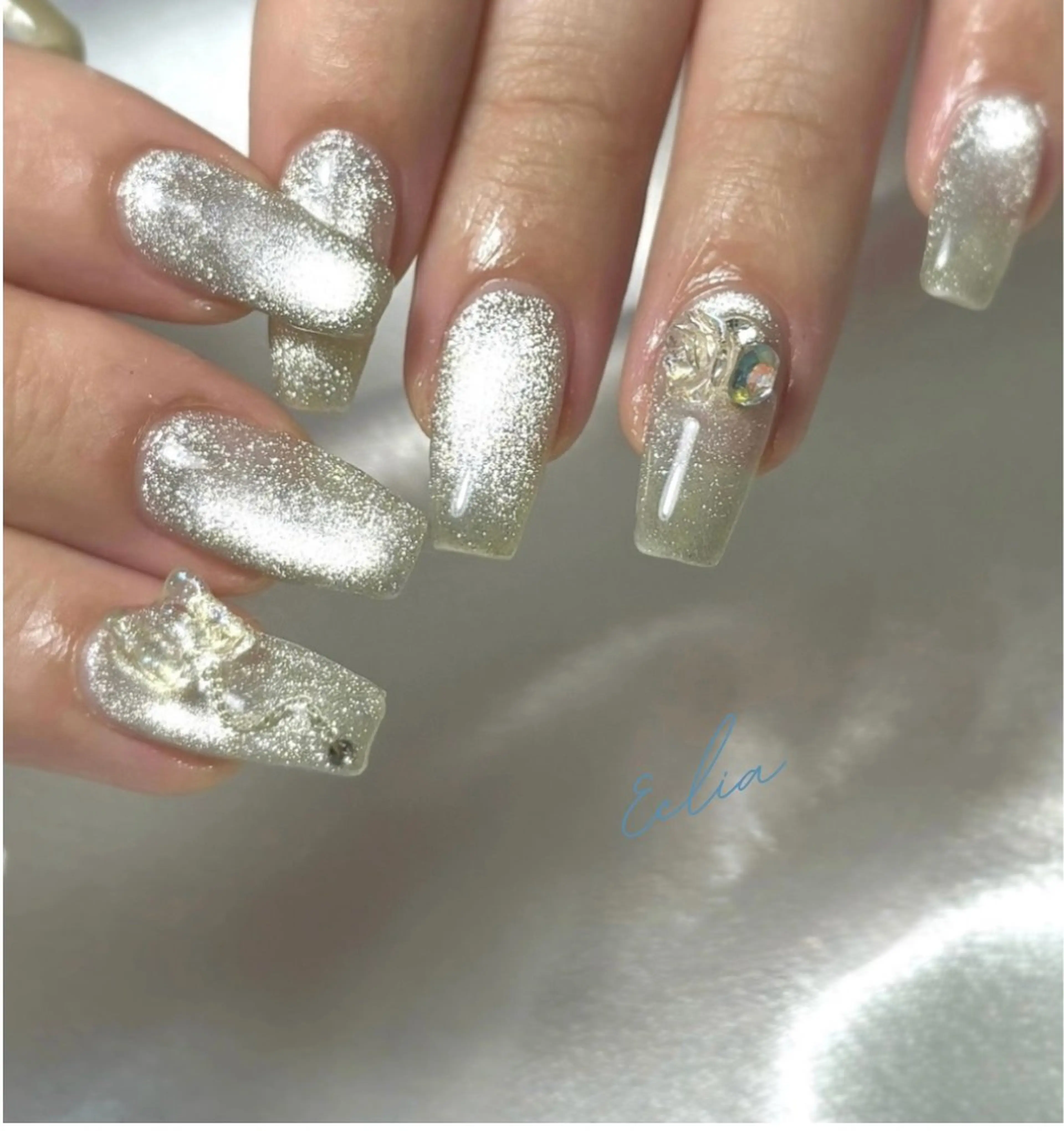ネイル キラキラネイル マグネットネイル シルバー ストーンネイル ハンドネイル nailsalon Ecliaのネイルデザイン