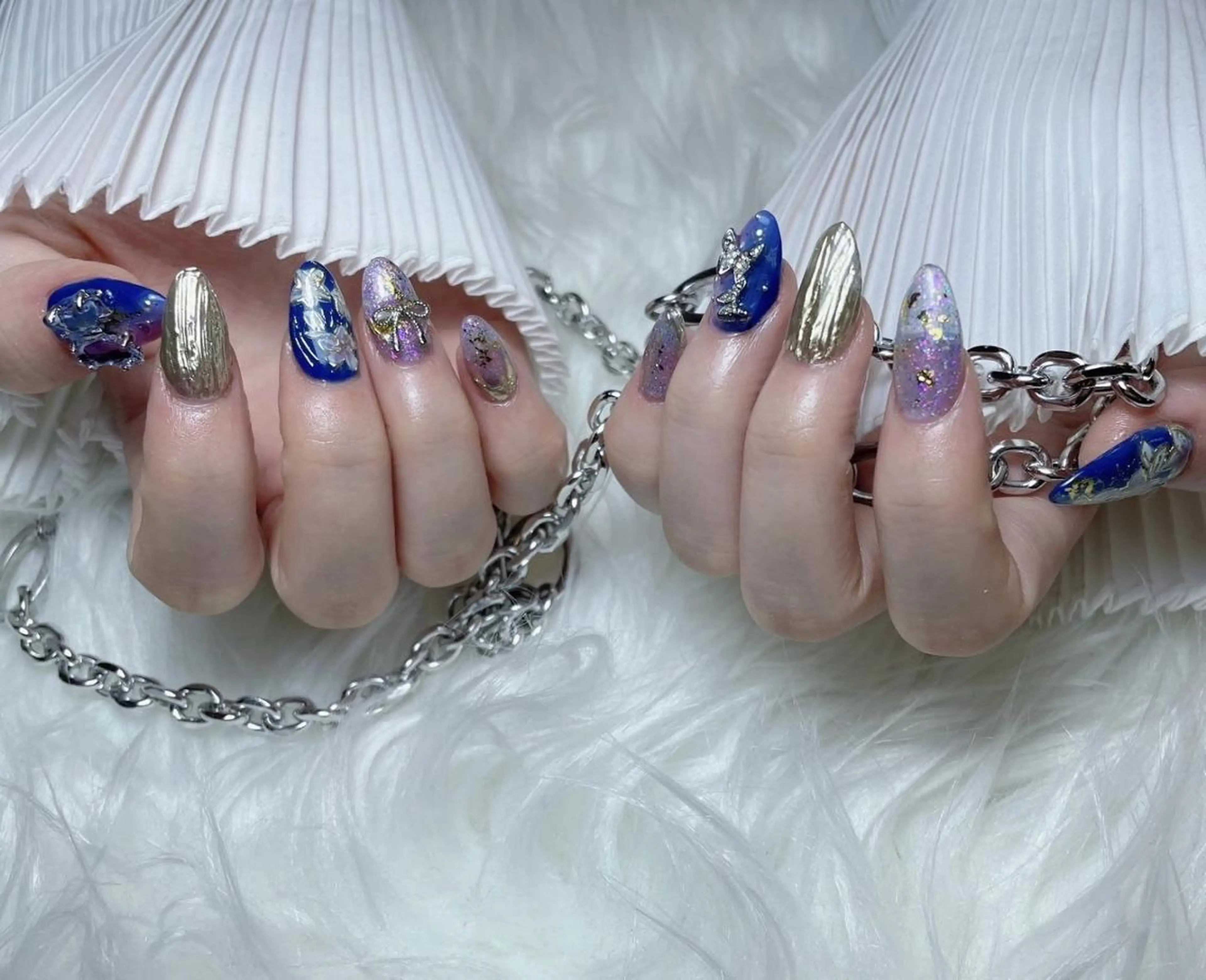 ネイル RAFFINE 月🦋🩵のネイルデザイン