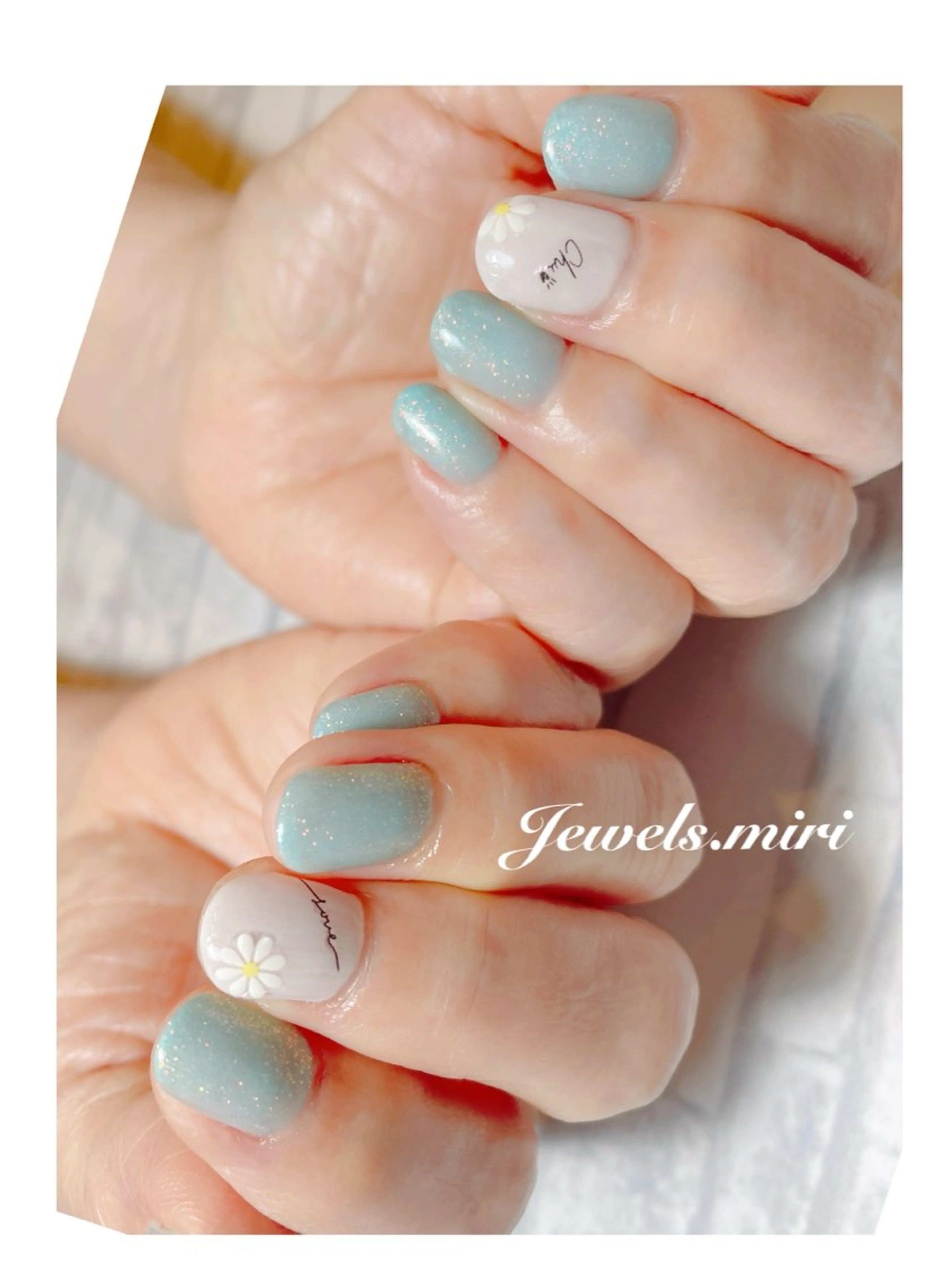 ネイル アートネイル オーロラネイル ブルー フラワーネイル ラメ(グリッター) Jewels nail lily 白楽所属・ネイルサロン Jewels Mのネイルデザイン