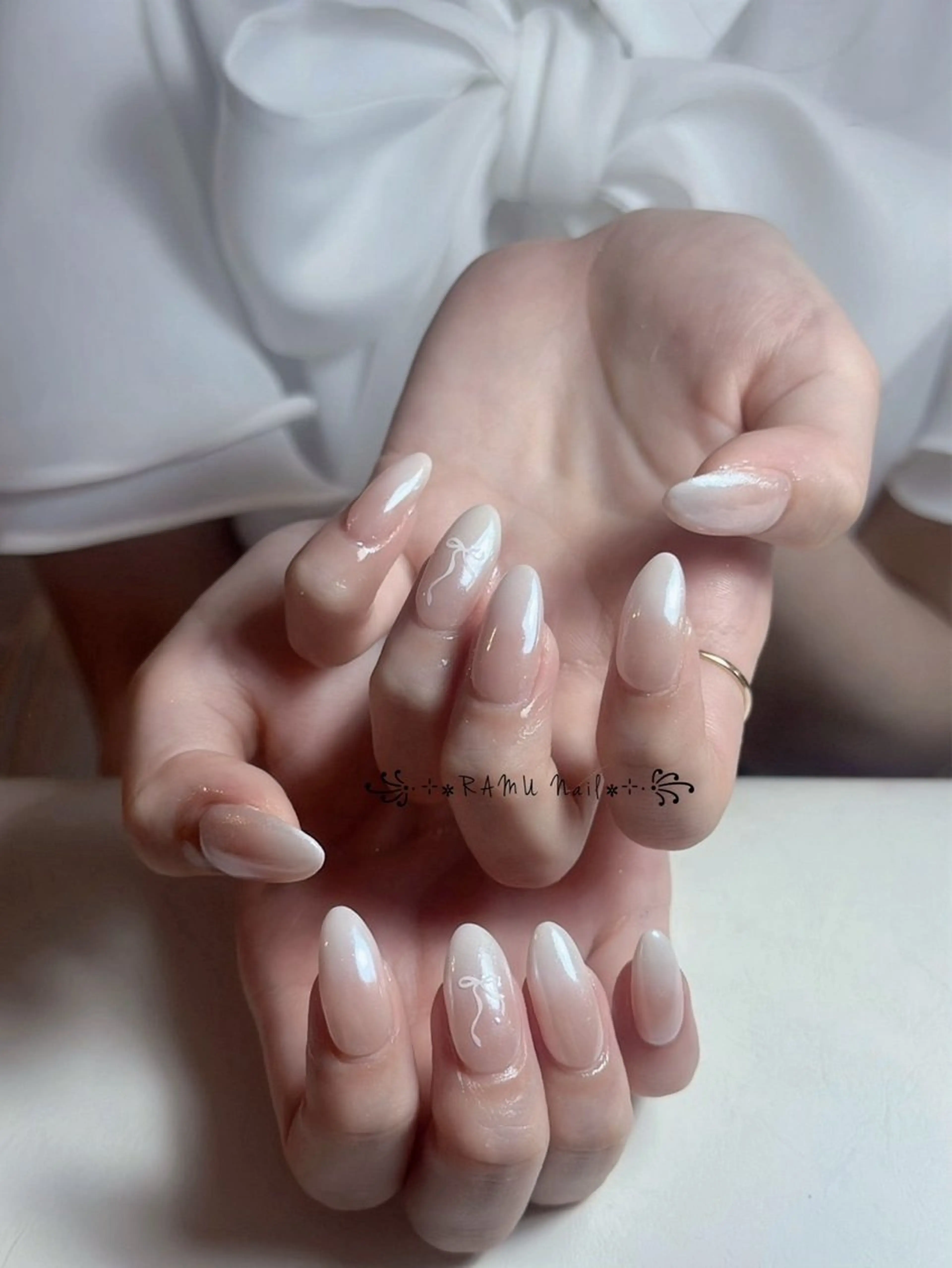 ネイル キラキラネイル マグネットネイル ミラーネイル ピンク リボン ハンドネイル RAMU Nail 恵比寿店のネイルデザイン