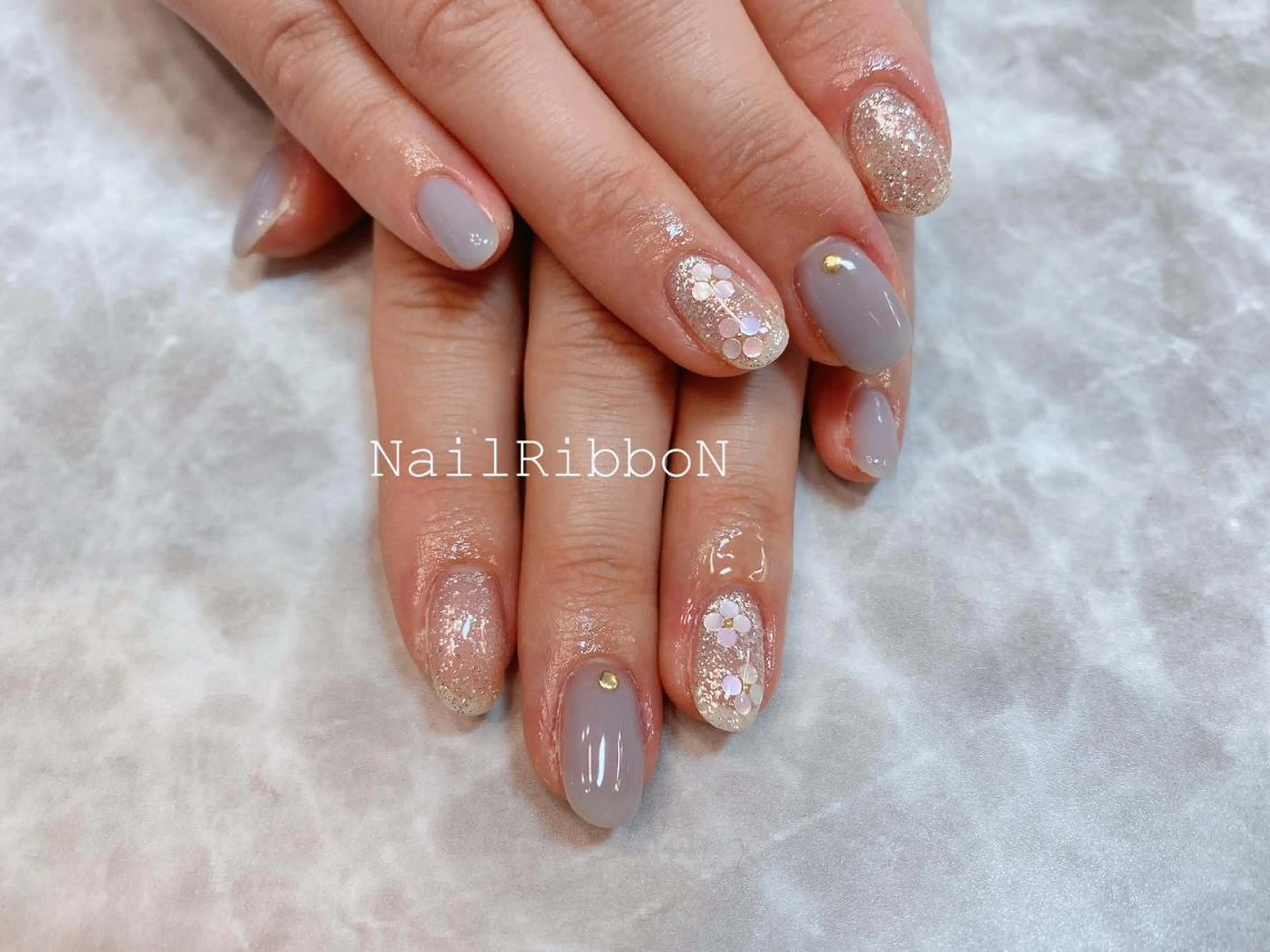 ネイル ネイルリボン 受付スタッフのネイルデザイン