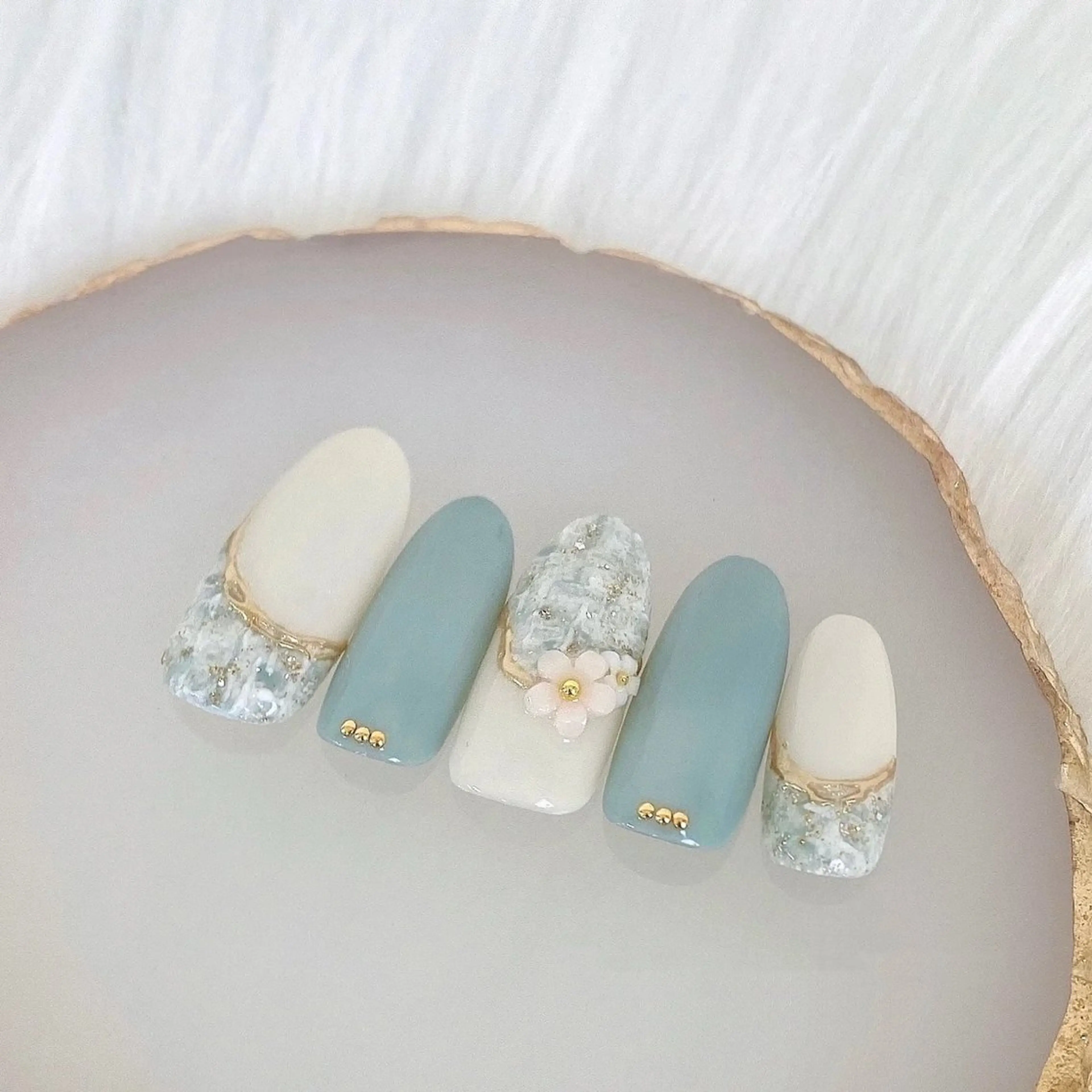 ネイル 春ネイル キューティプティ池袋東口店所属・🍒✨萌 萌✨🍒のネイルデザイン