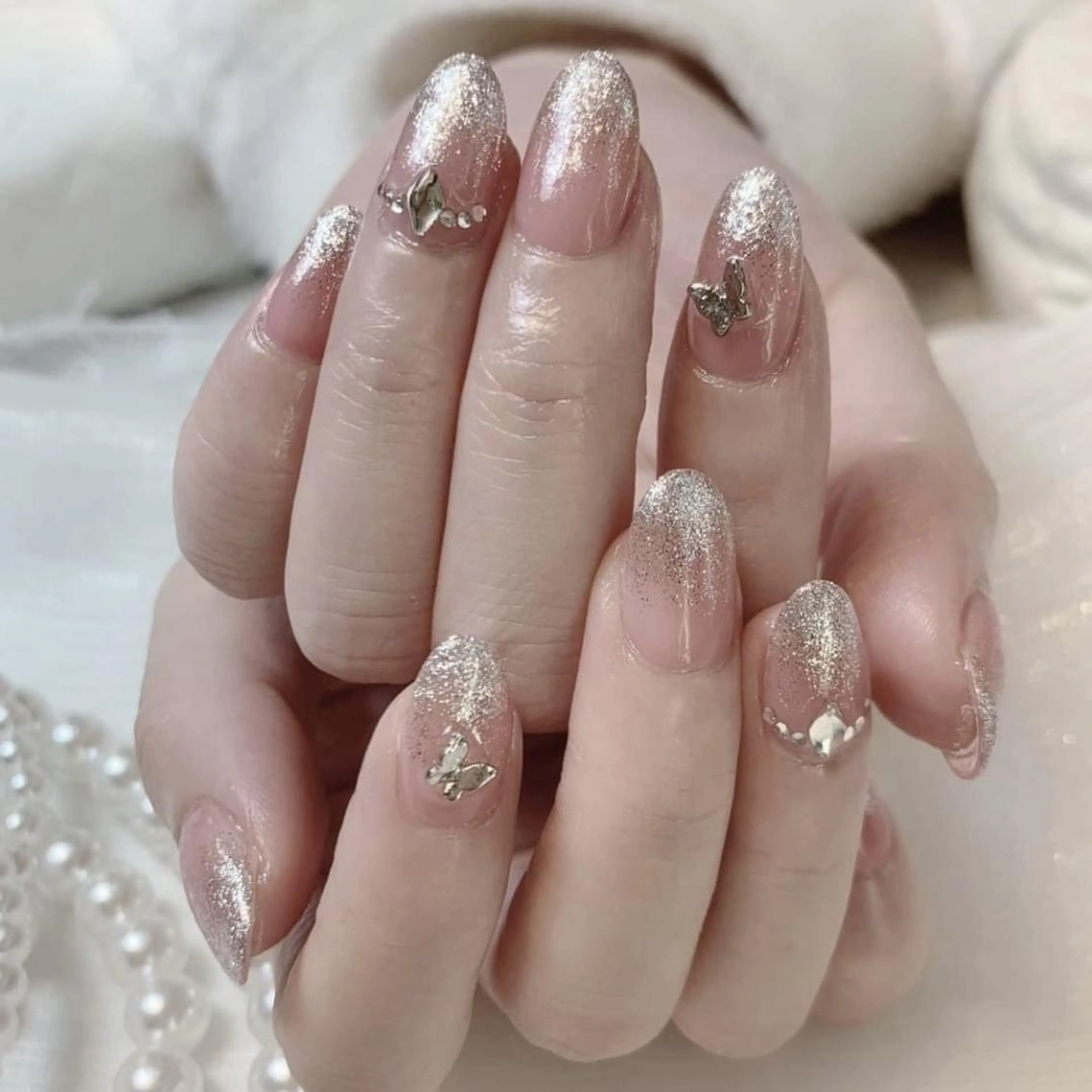 ネイル RAFFINE 月🦋🩵のネイルデザイン