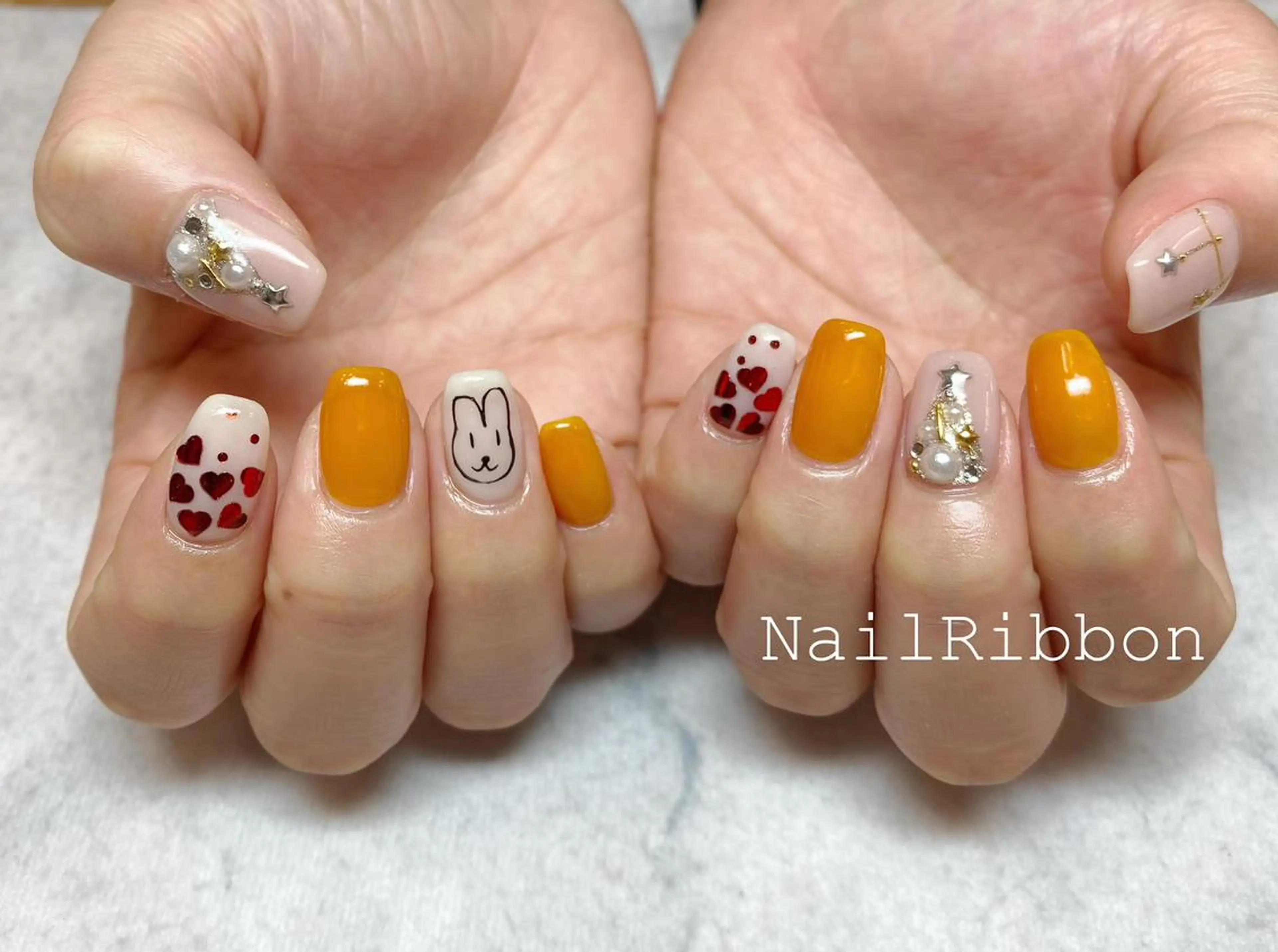ネイル ネイルリボン 受付スタッフのネイルデザイン