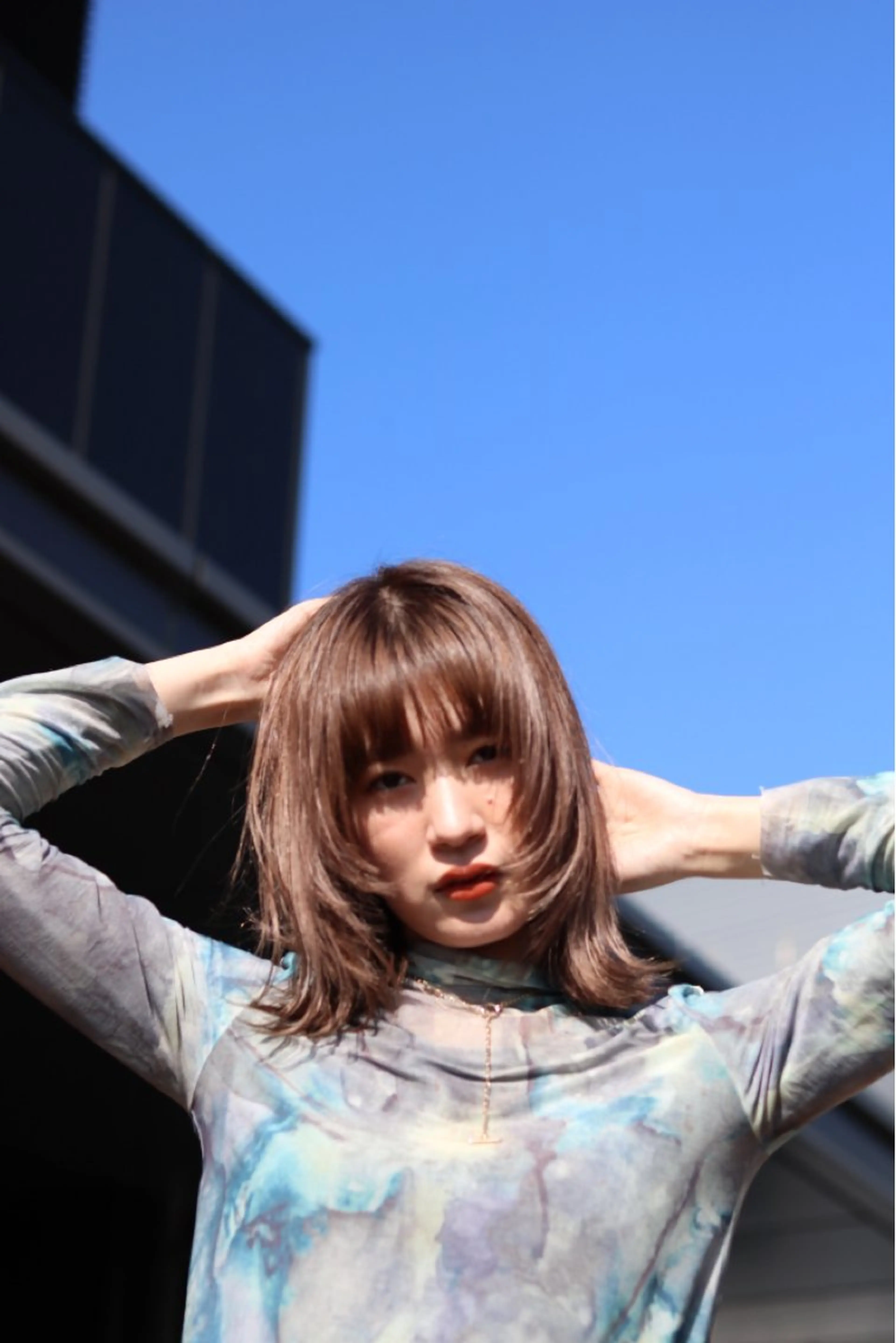 ミディアム Yui. ハイトーン/パーマ/のヘアスタイル