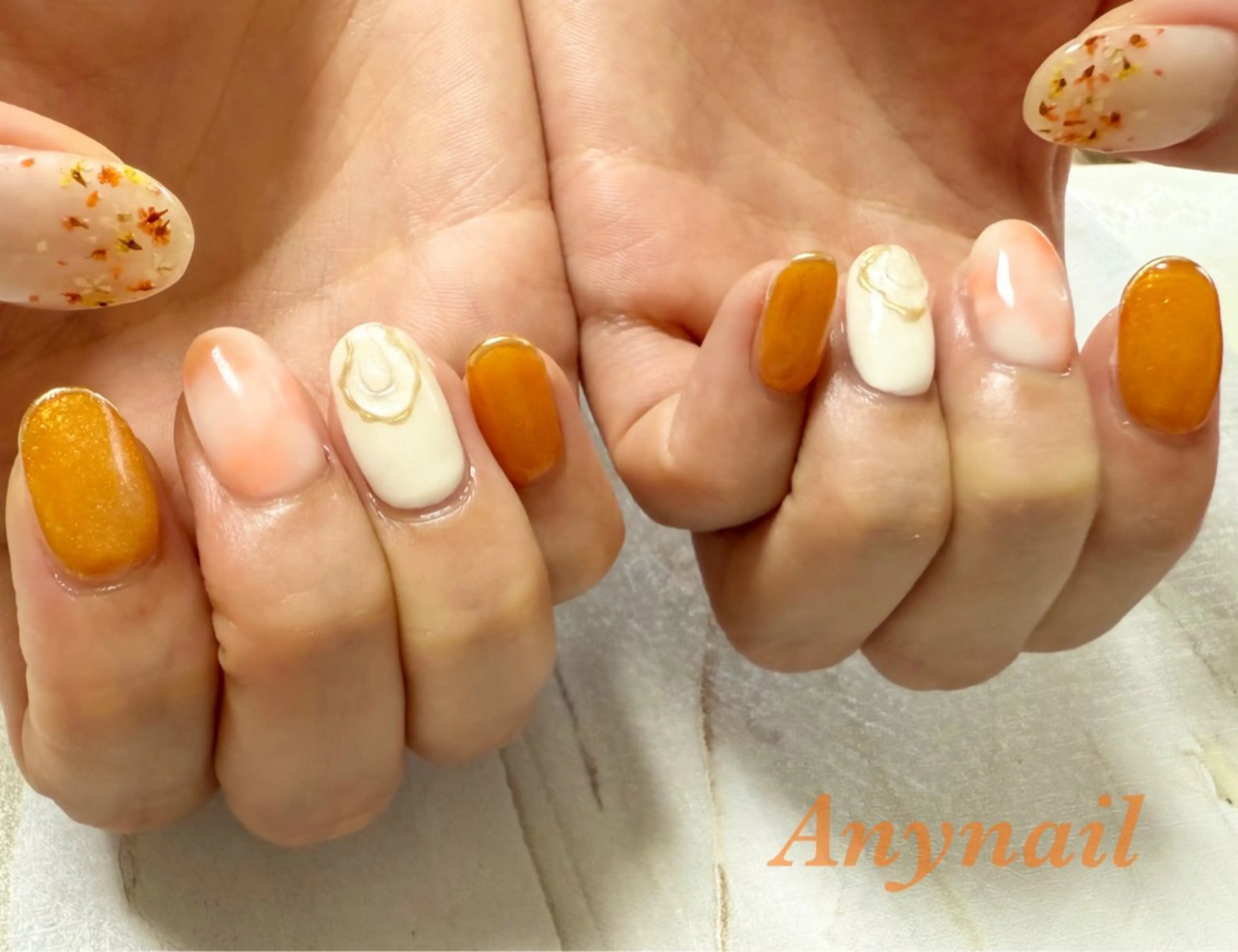 ネイル ブルー フラワーネイル マグネットネイル ミラーネイル オレンジ ハンドネイル 岩澤 恵子のネイルデザイン