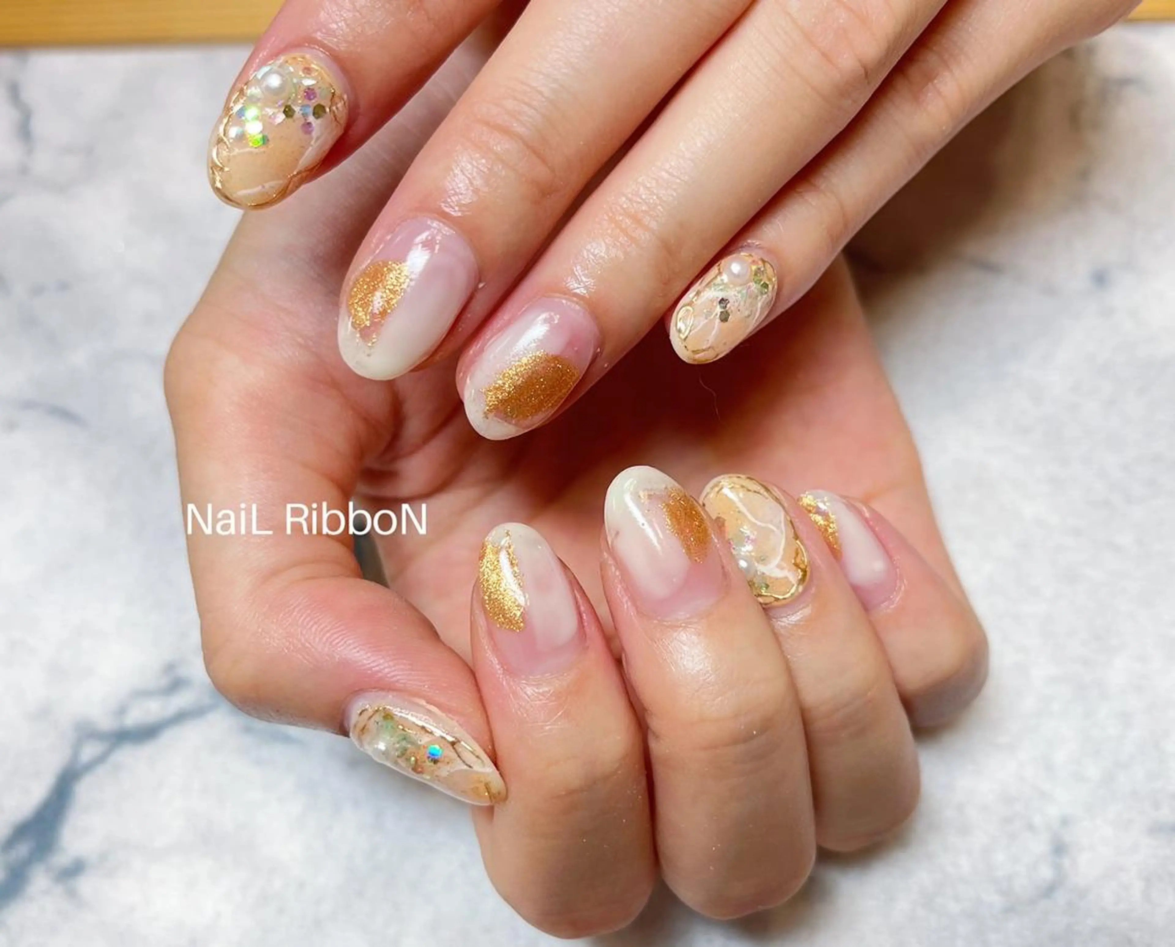 ネイル ネイルリボン 受付スタッフのネイルデザイン