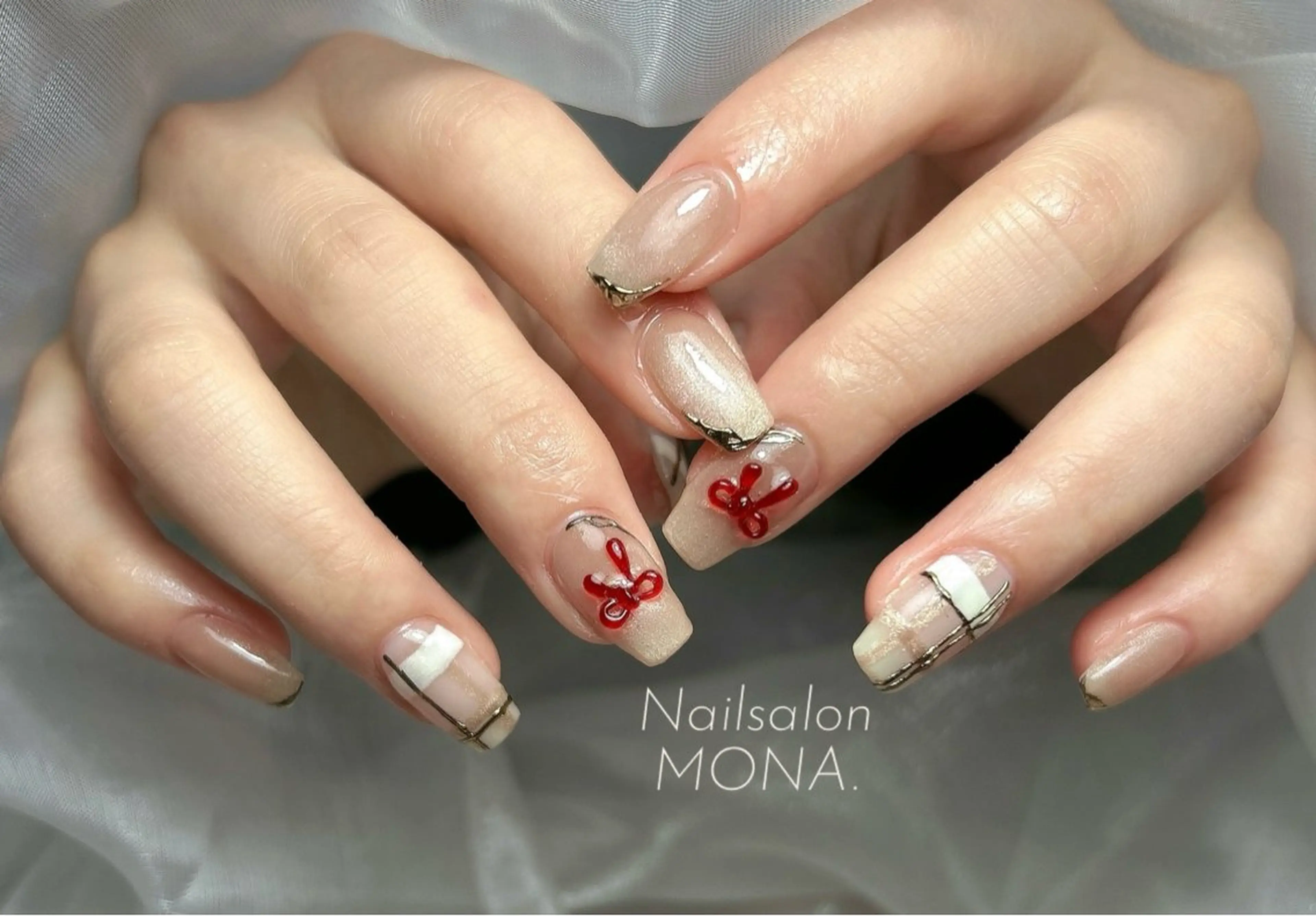 ネイル マグネットネイル リボン ハンドネイル Nailsalon MONA.のネイルデザイン