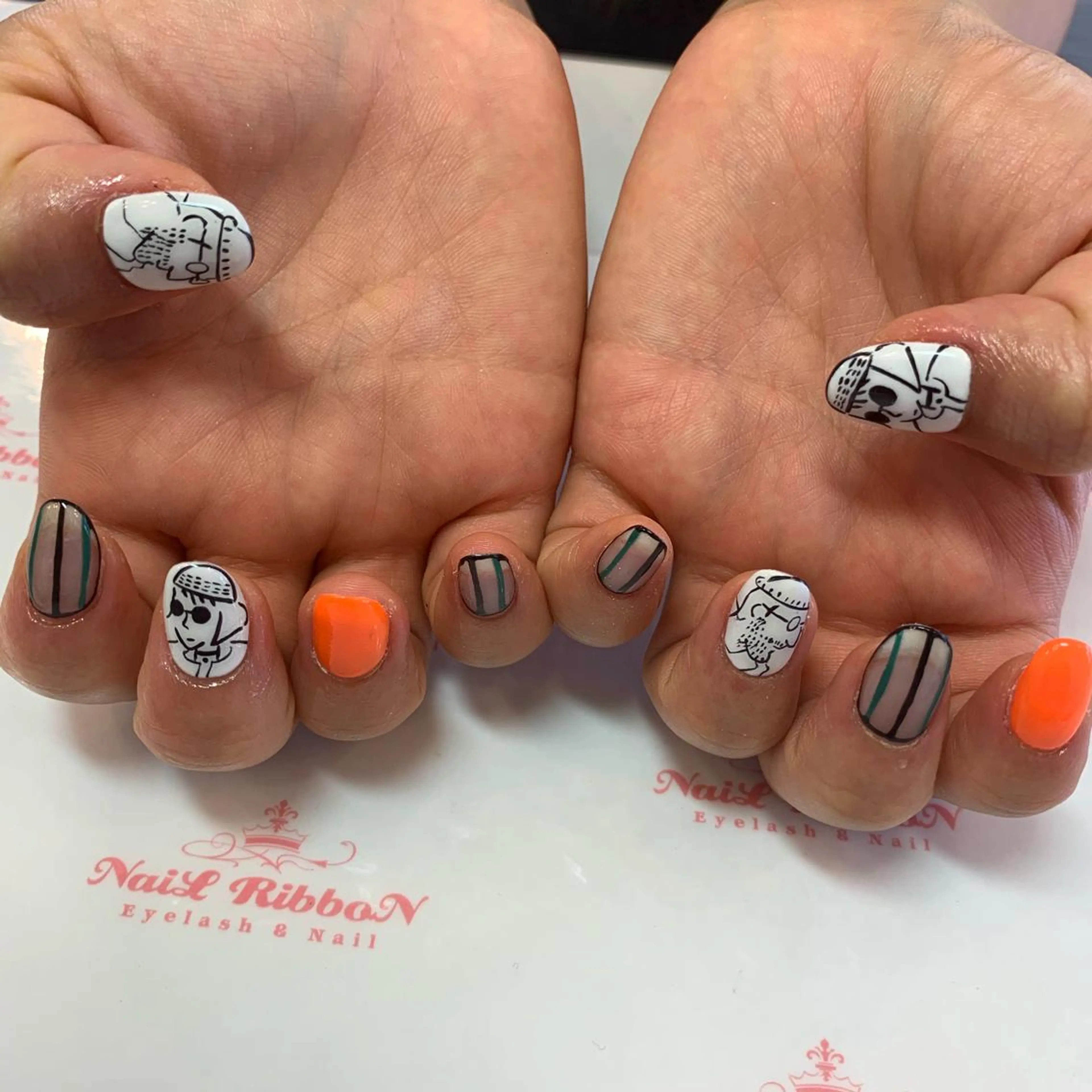 ネイル ネイルリボン 受付スタッフのネイルデザイン