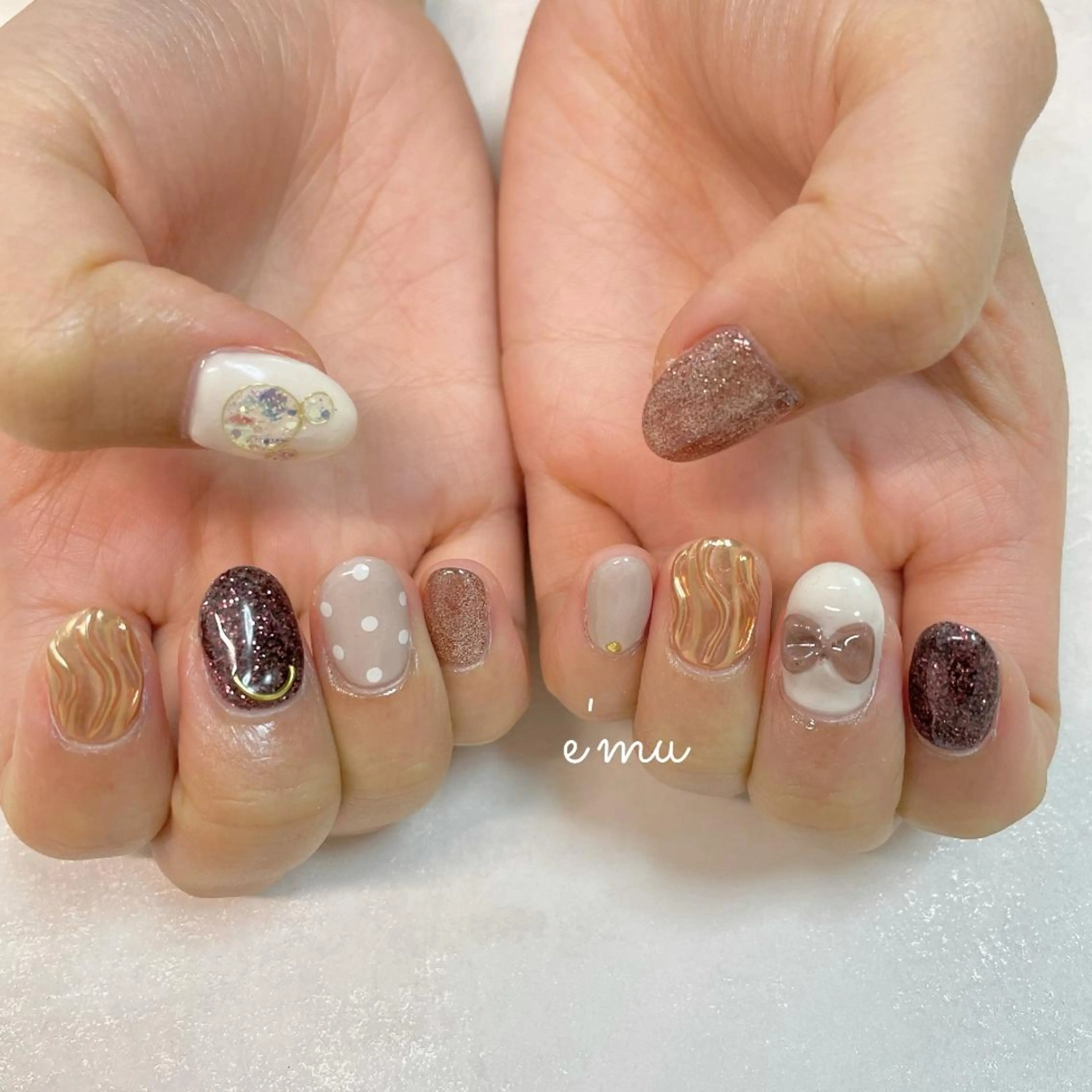 ネイル キラキラネイル リボン nail salon e'mu💐のネイルデザイン