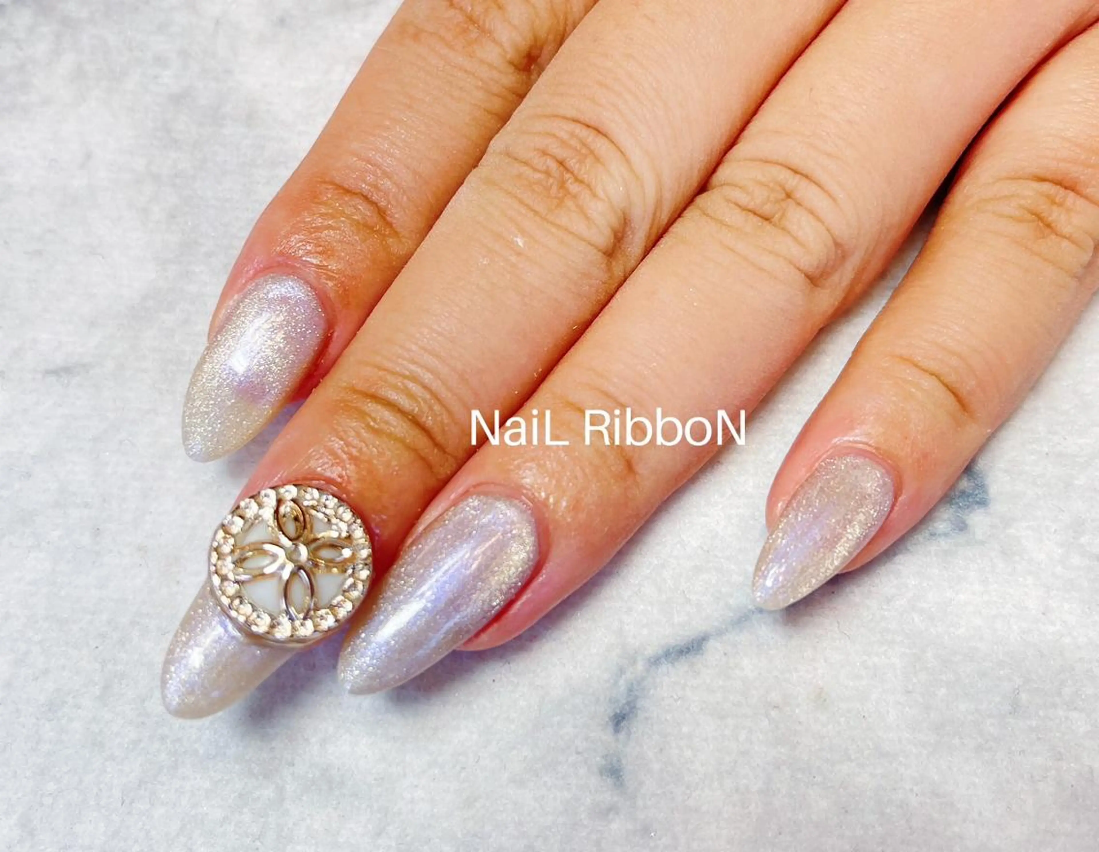 ネイル ネイルリボン 受付スタッフのネイルデザイン