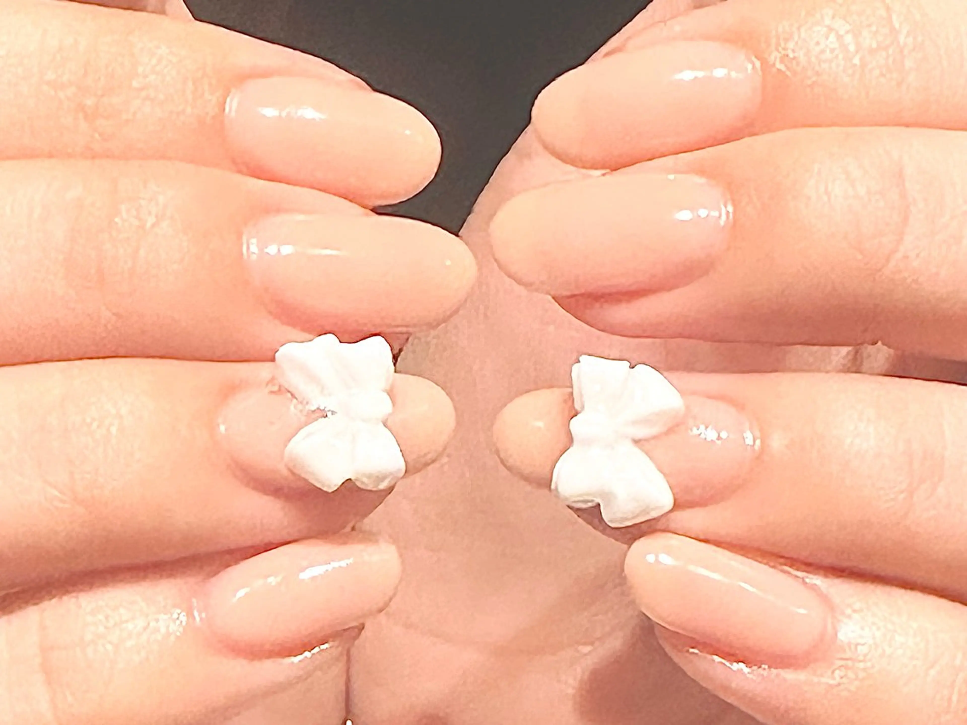 オフ込♡ワンカラーリボン付きネイル♡の写真