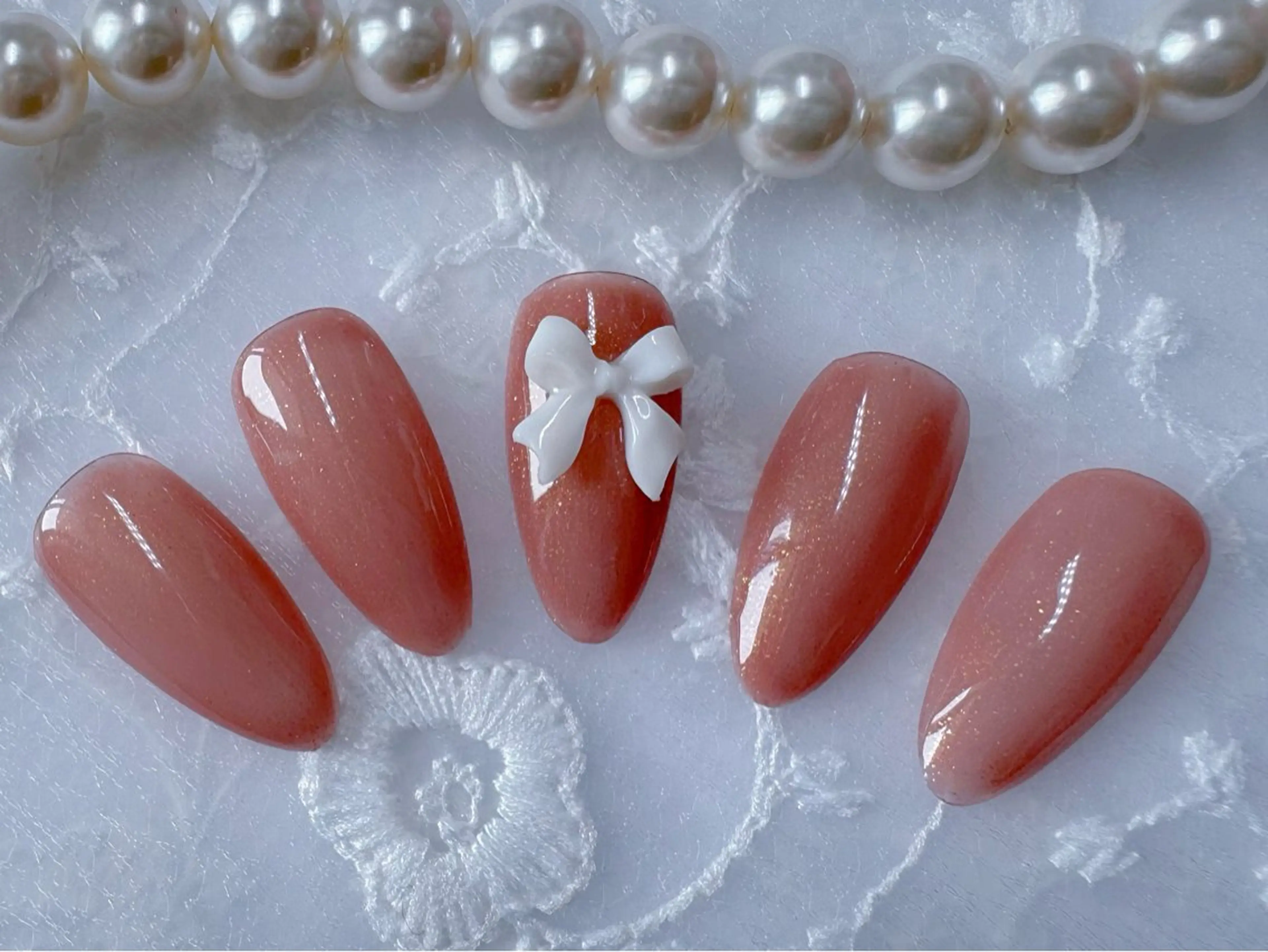 ネイル リボン ハンドネイル フットネイル ビューティーサロン　フラワーズ所属・ビューティーサロン フラワーズ　ヒのネイルデザイン