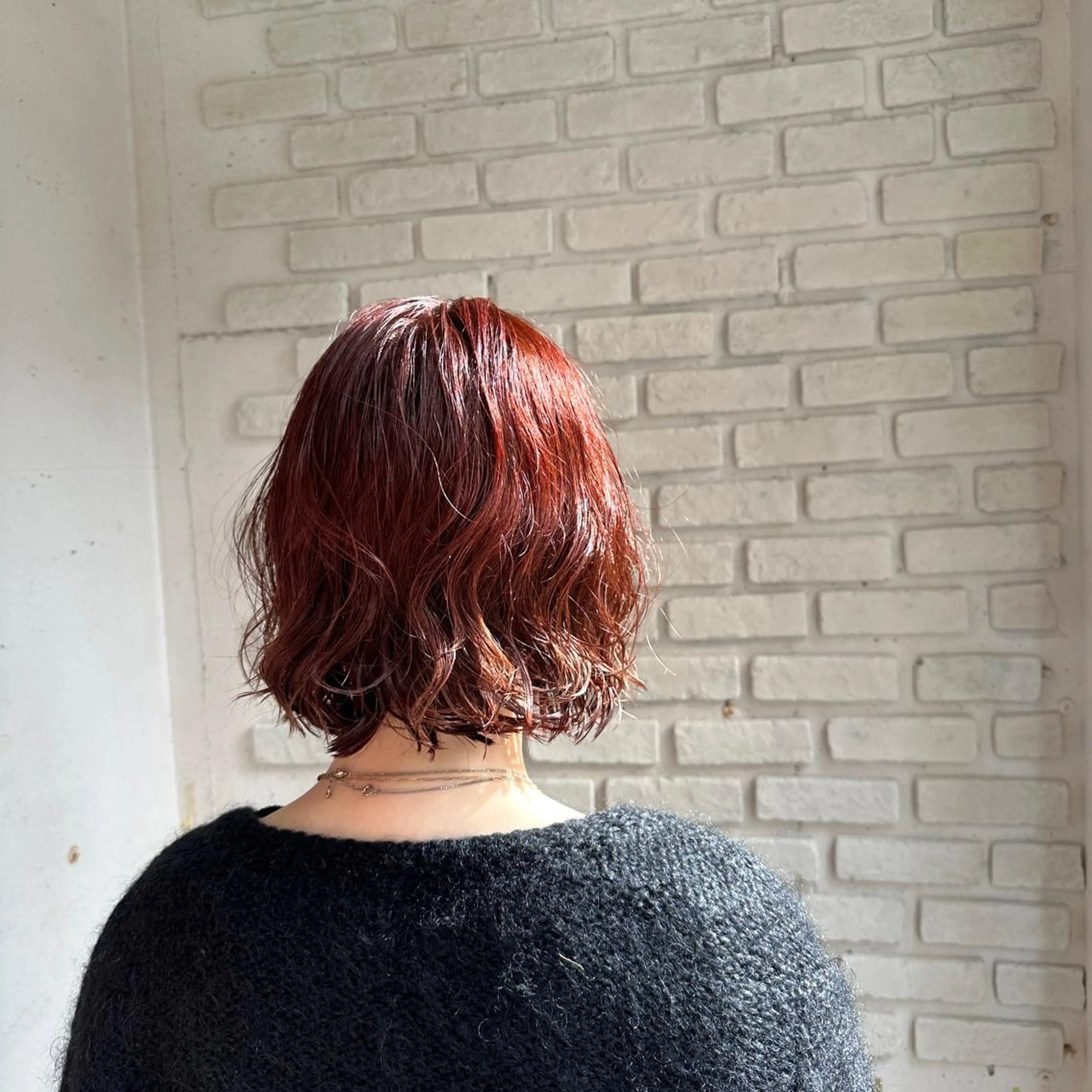 パーマ hozumi bilanciaのヘアスタイル