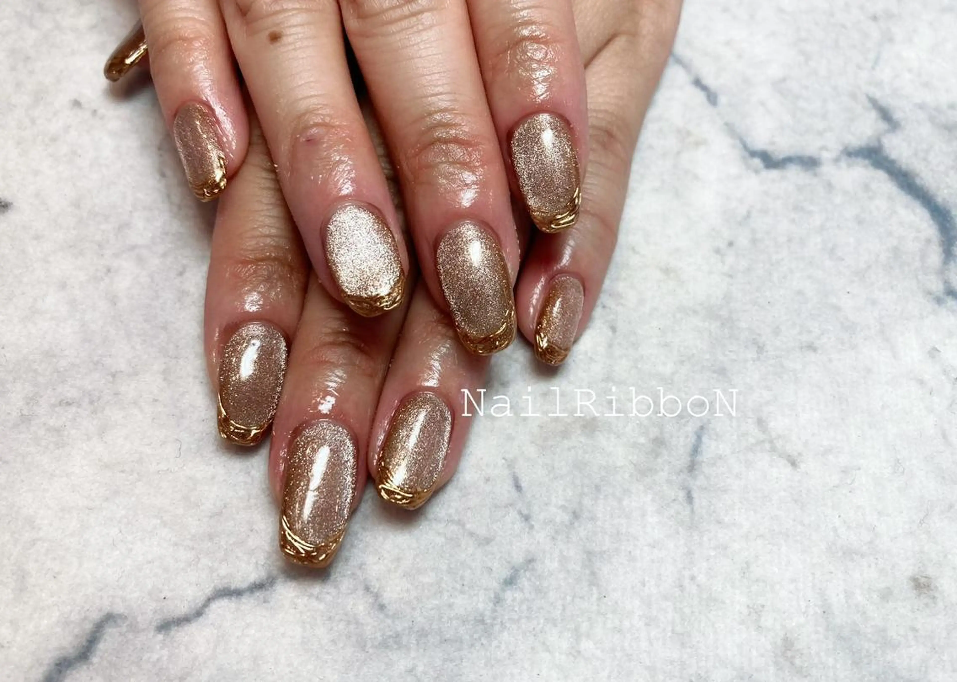 ネイル ネイルリボン 受付スタッフのネイルデザイン