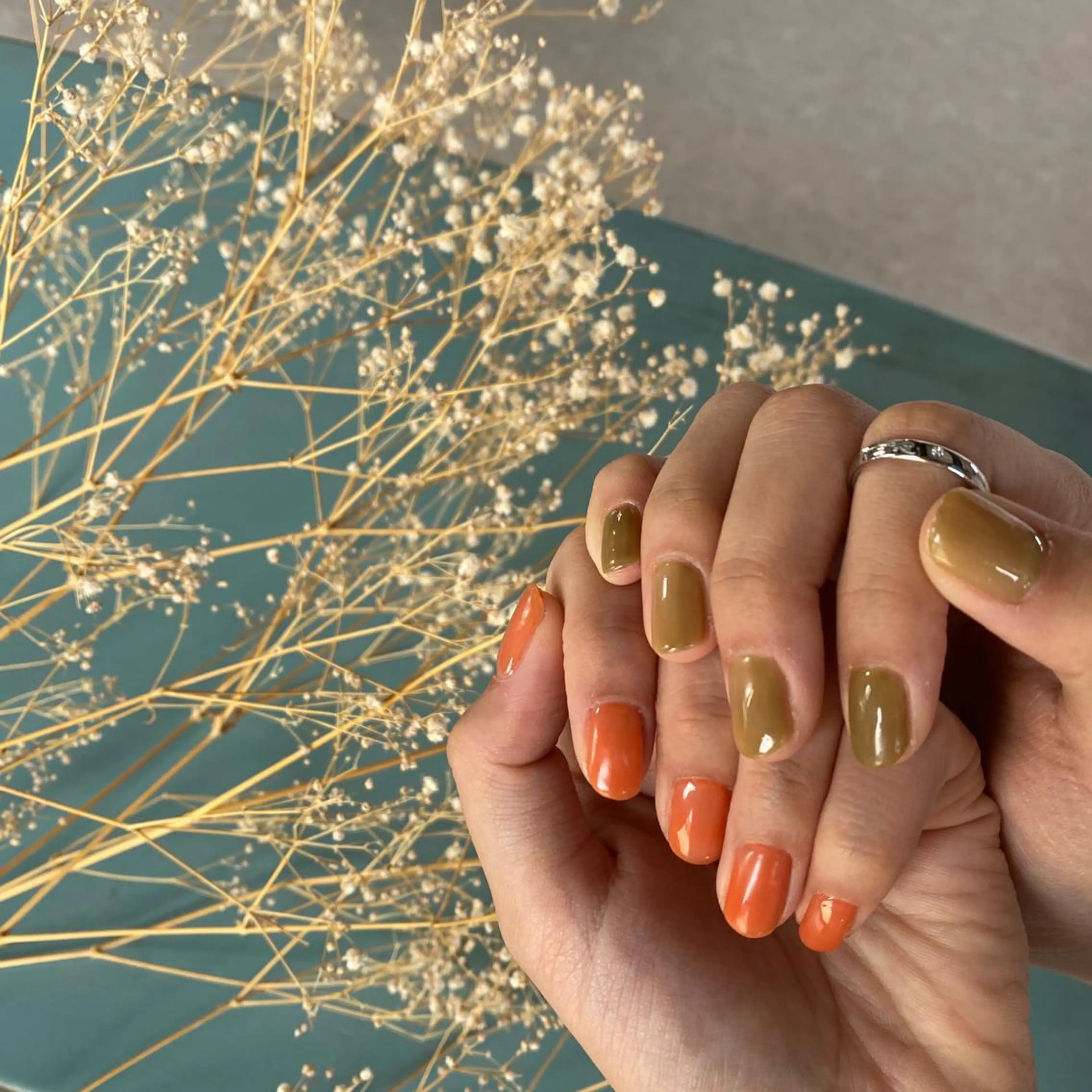 ネイル ジェルネイル ワンカラーネイル オレンジ ピスタチオネイル mimin. by felimo所属・mimin. by felimoのネイルデザイン