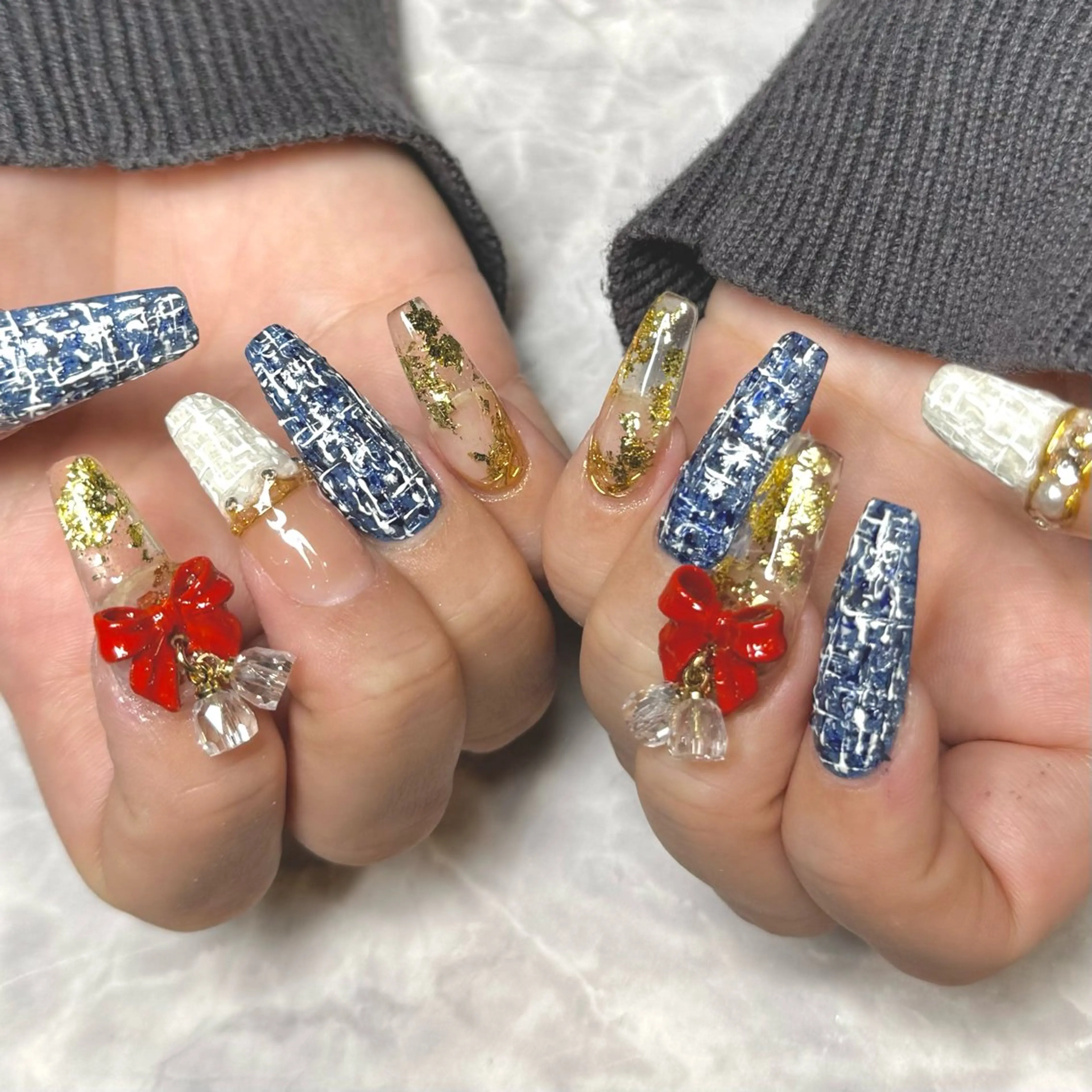 ネイル クリアネイル キラキラネイル リボン ツイードネイル 冬ネイル ハンドネイル Nail Salon Lillion【リリオン】所属・lillion karenのネイルデザイン