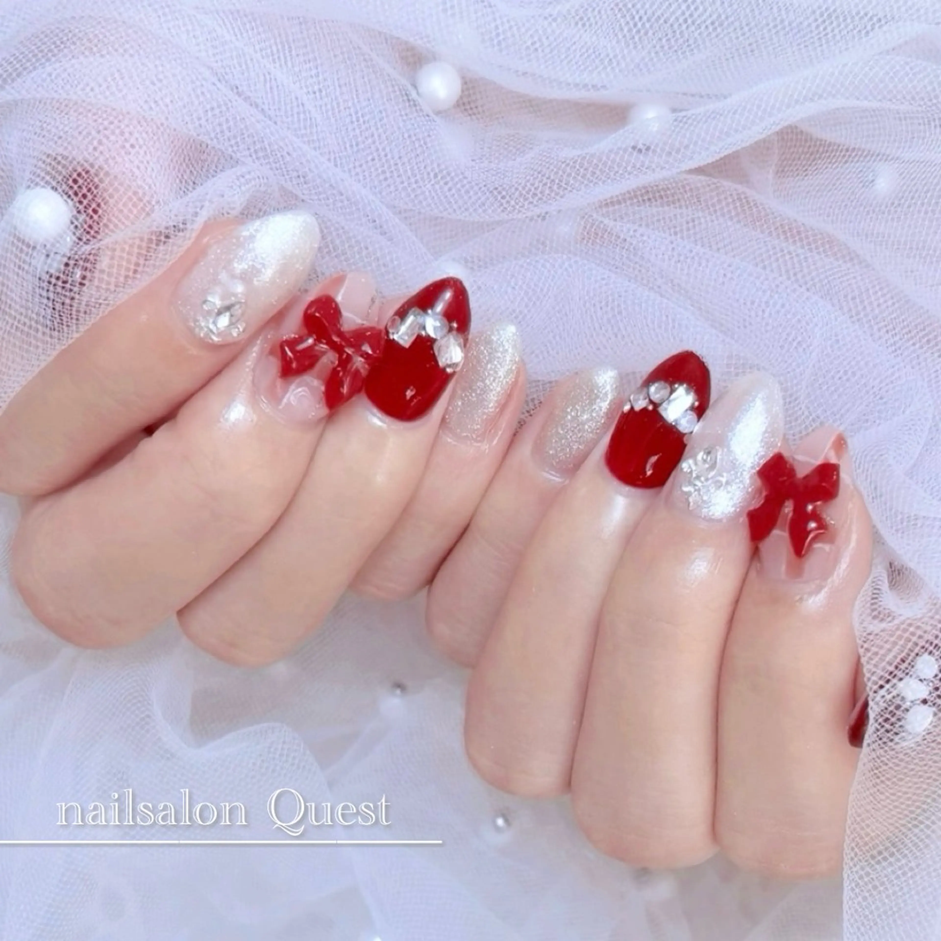ネイル キラキラネイル ぷっくりネイル 赤色 リボン ハンドネイル nailsalon Questのネイルデザイン