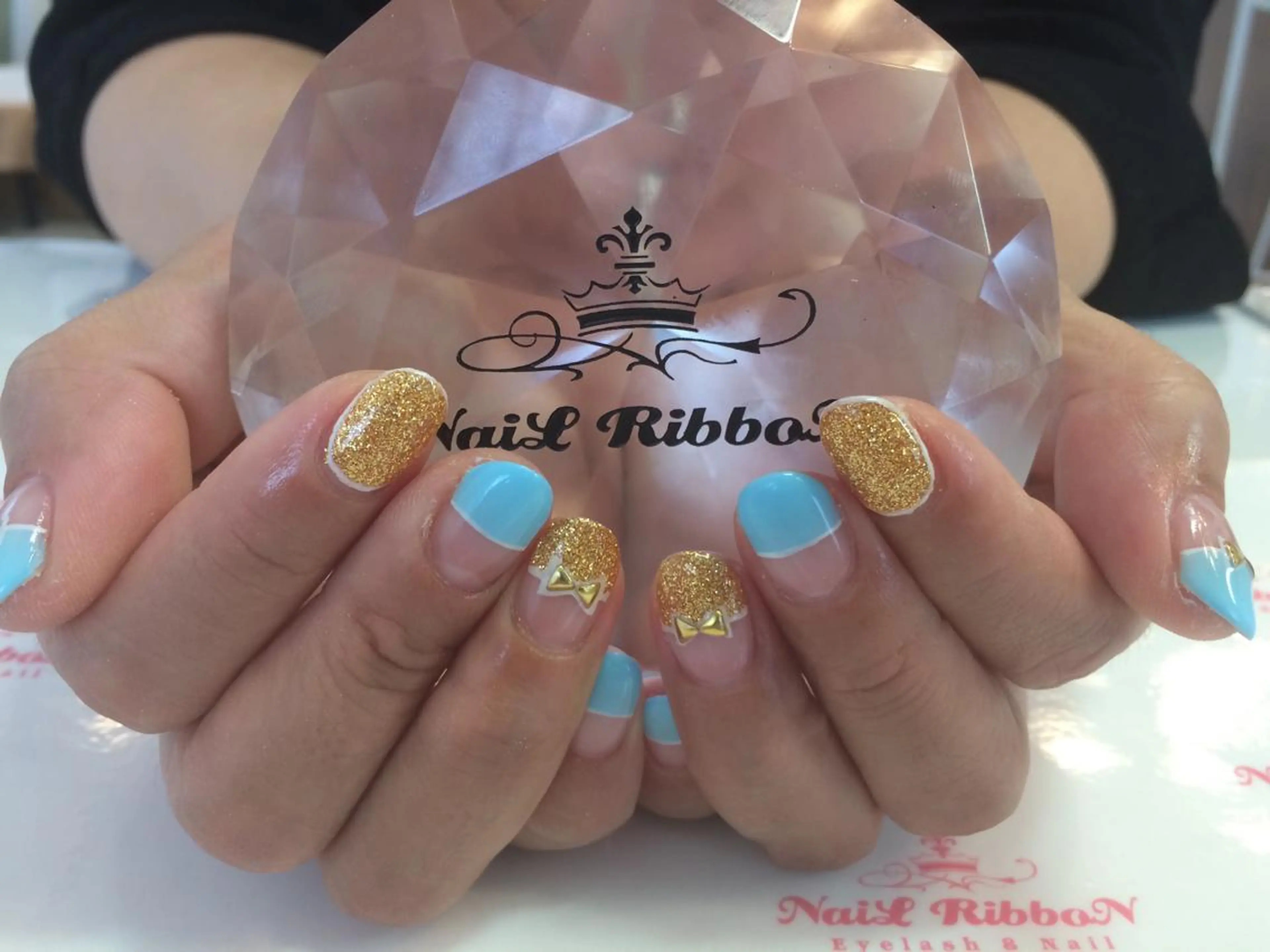 ネイル ネイルリボン 受付スタッフのネイルデザイン