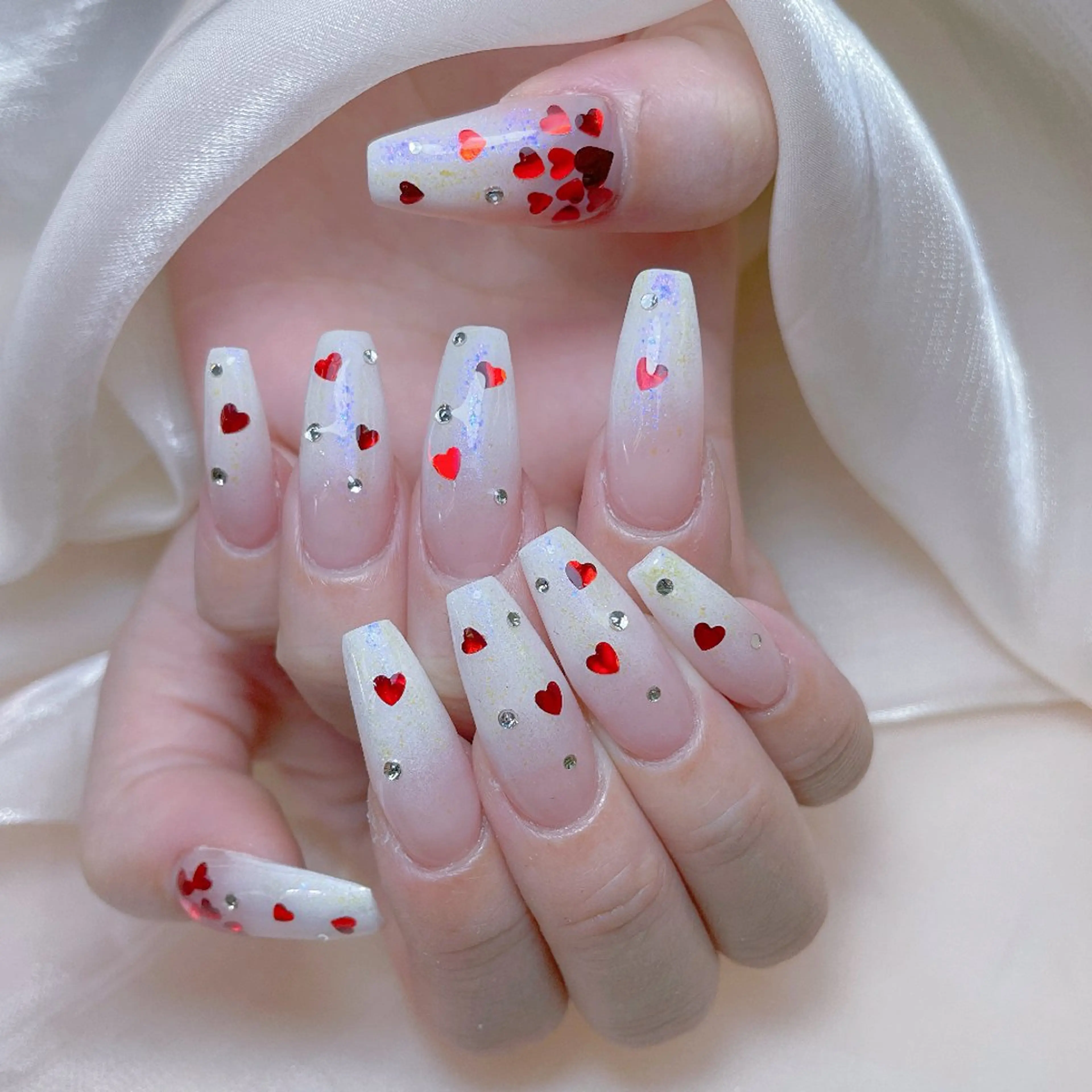 ネイル チークネイル ガーリー キラキラネイル 韓国ネイル リボン NailPrincess所属・princess スカルプ専門店のネイルデザイン