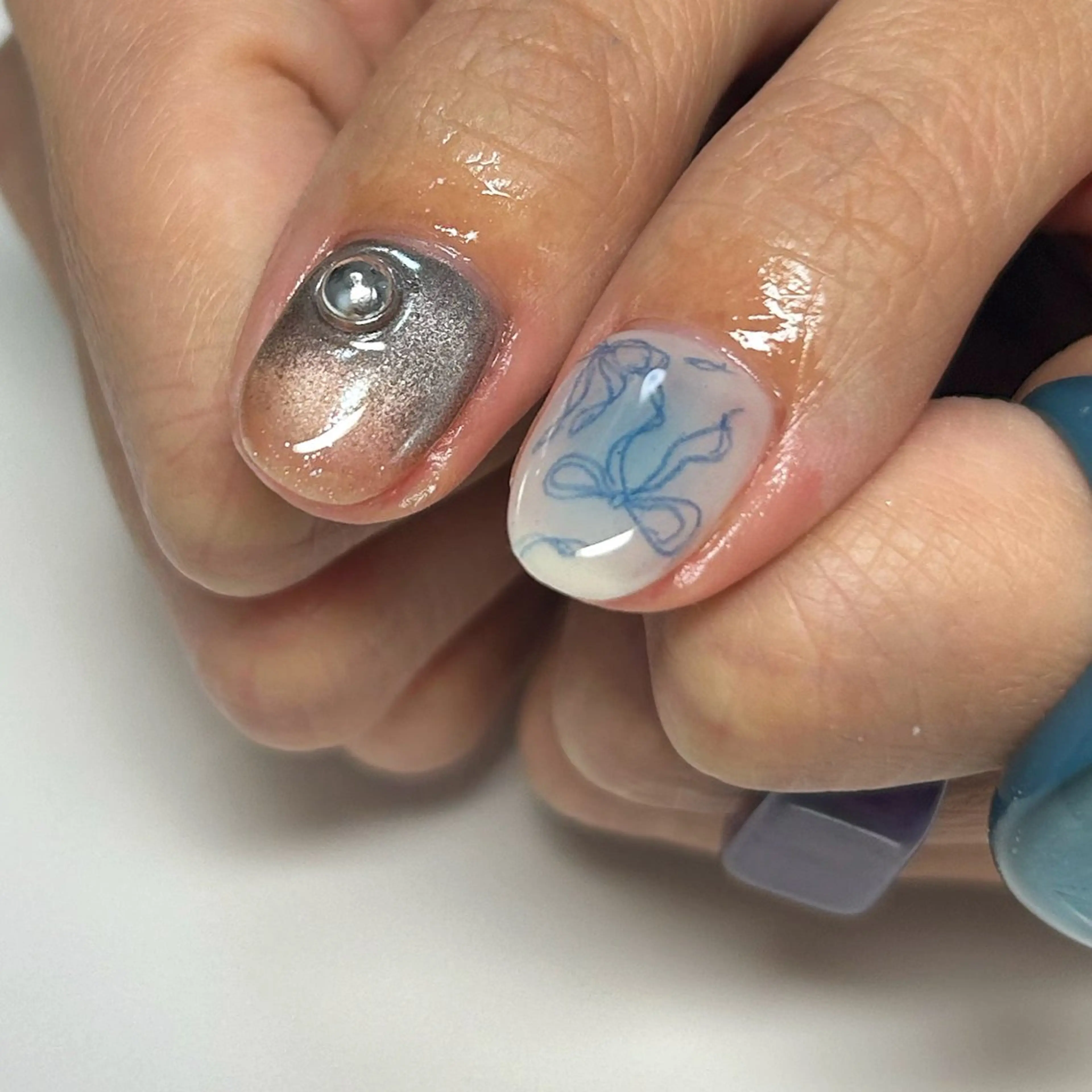 ネイル ブルー リボン ハンドネイル ネイル空間所属・ユキ @_yk_nail_のネイルデザイン