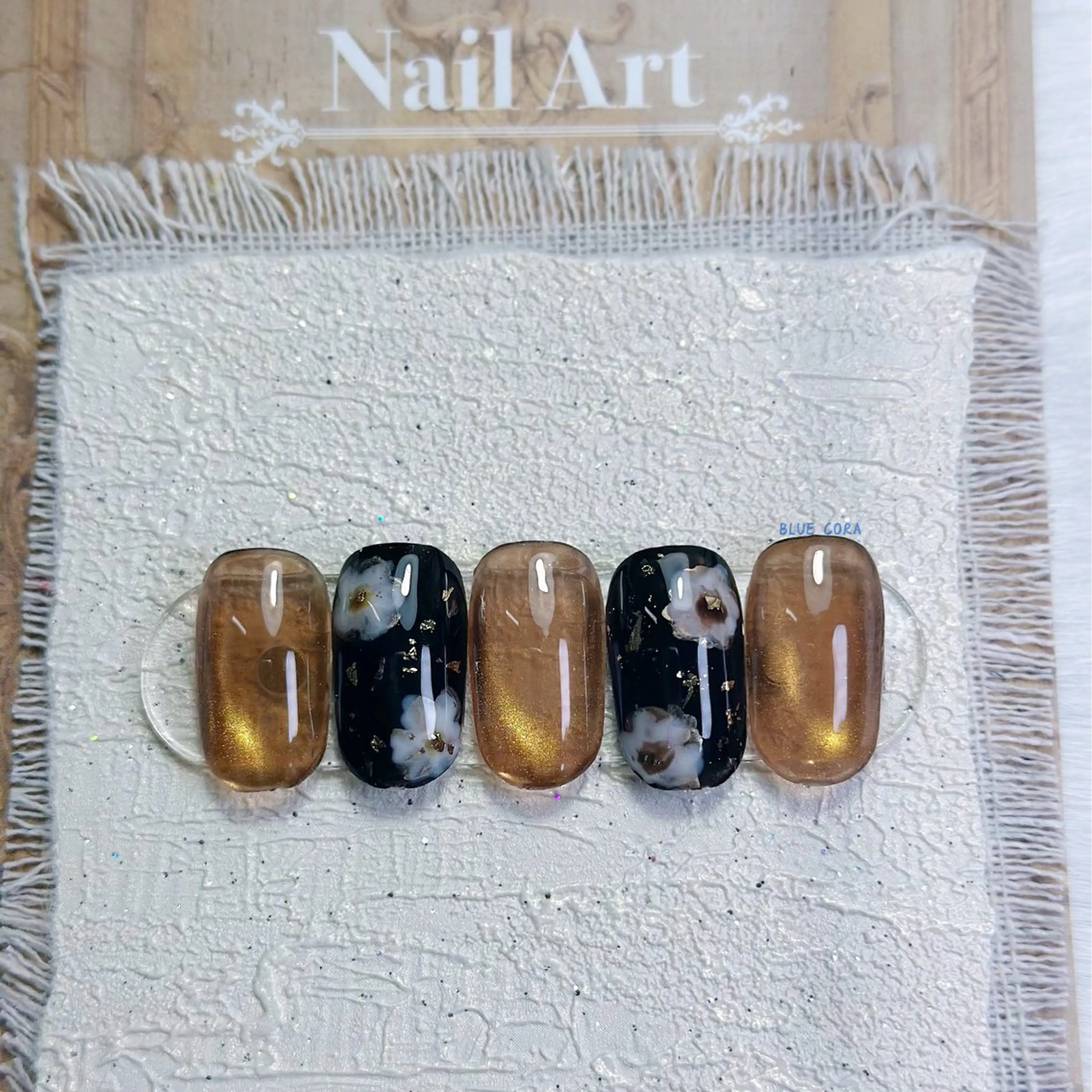 ネイル ブラウン クリアネイル フラワーネイル マグネットネイル ハンドネイル ハンドケア BLUE CORA所属・BLUE CORAのネイルデザイン