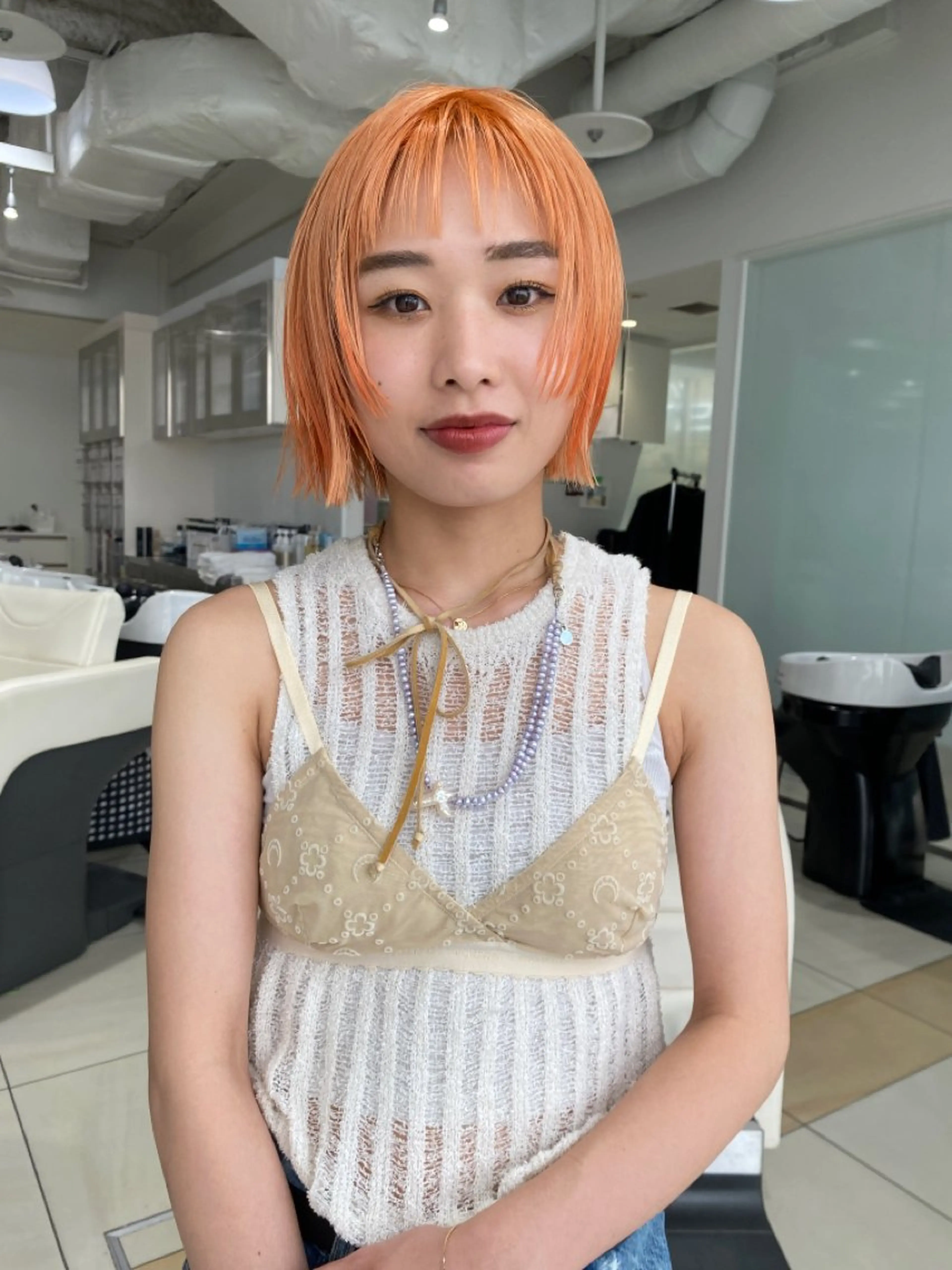 ミディアム カラー オレンジ ボブ キタ リオナのヘアスタイル