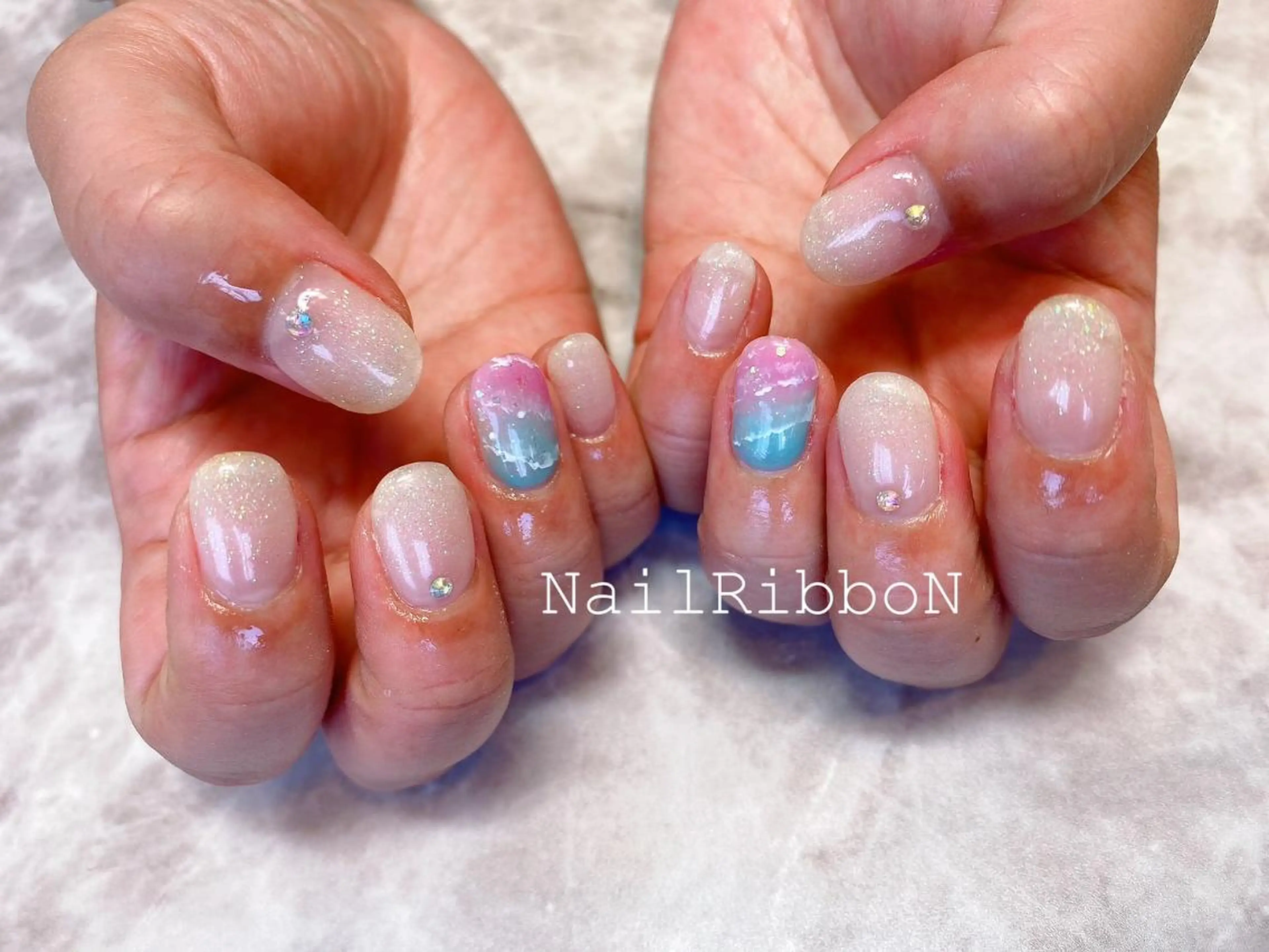 ネイル ネイルリボン 受付スタッフのネイルデザイン