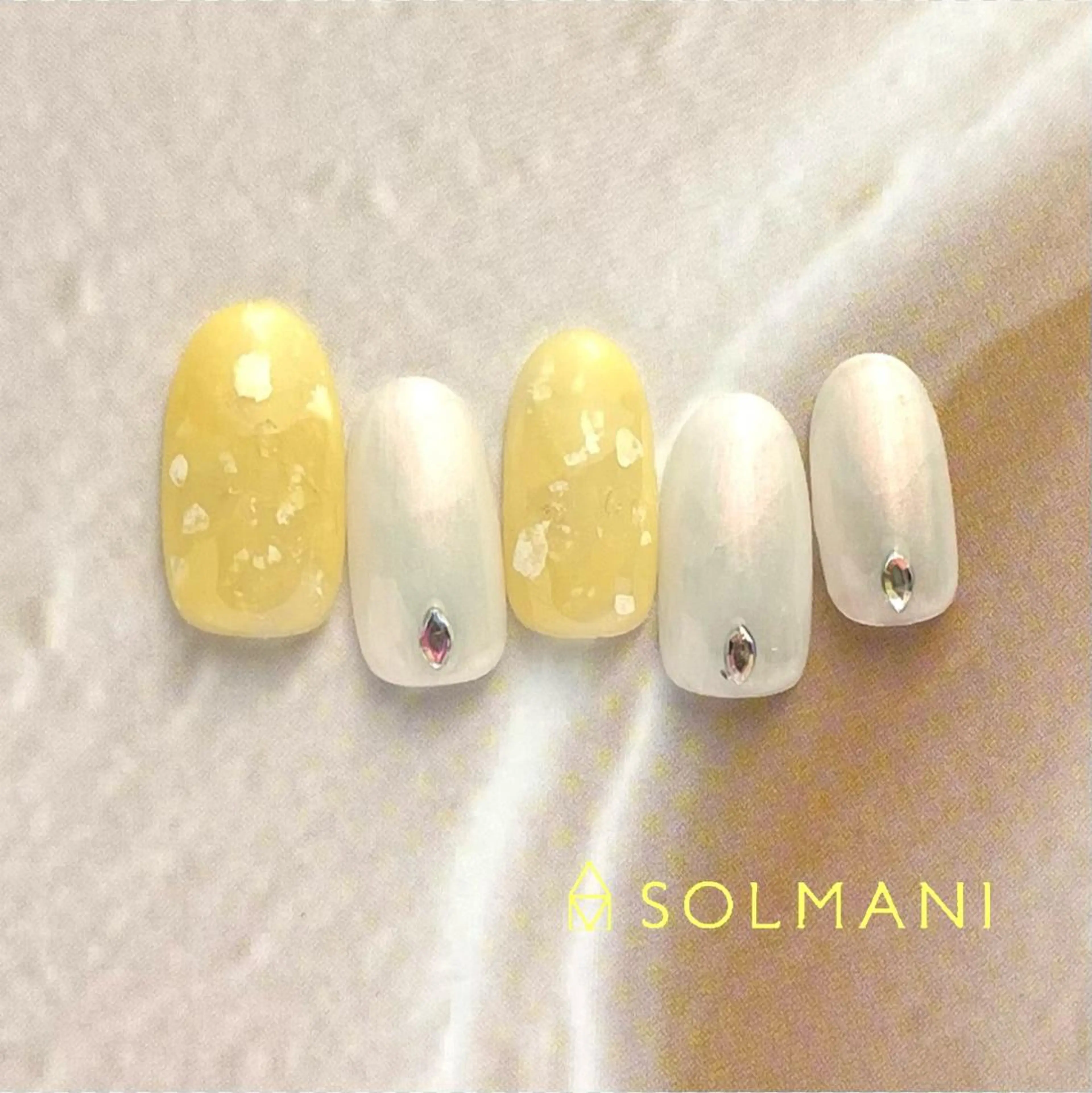 ネイル 黄色 SOLMANI 予約担当のネイルデザイン