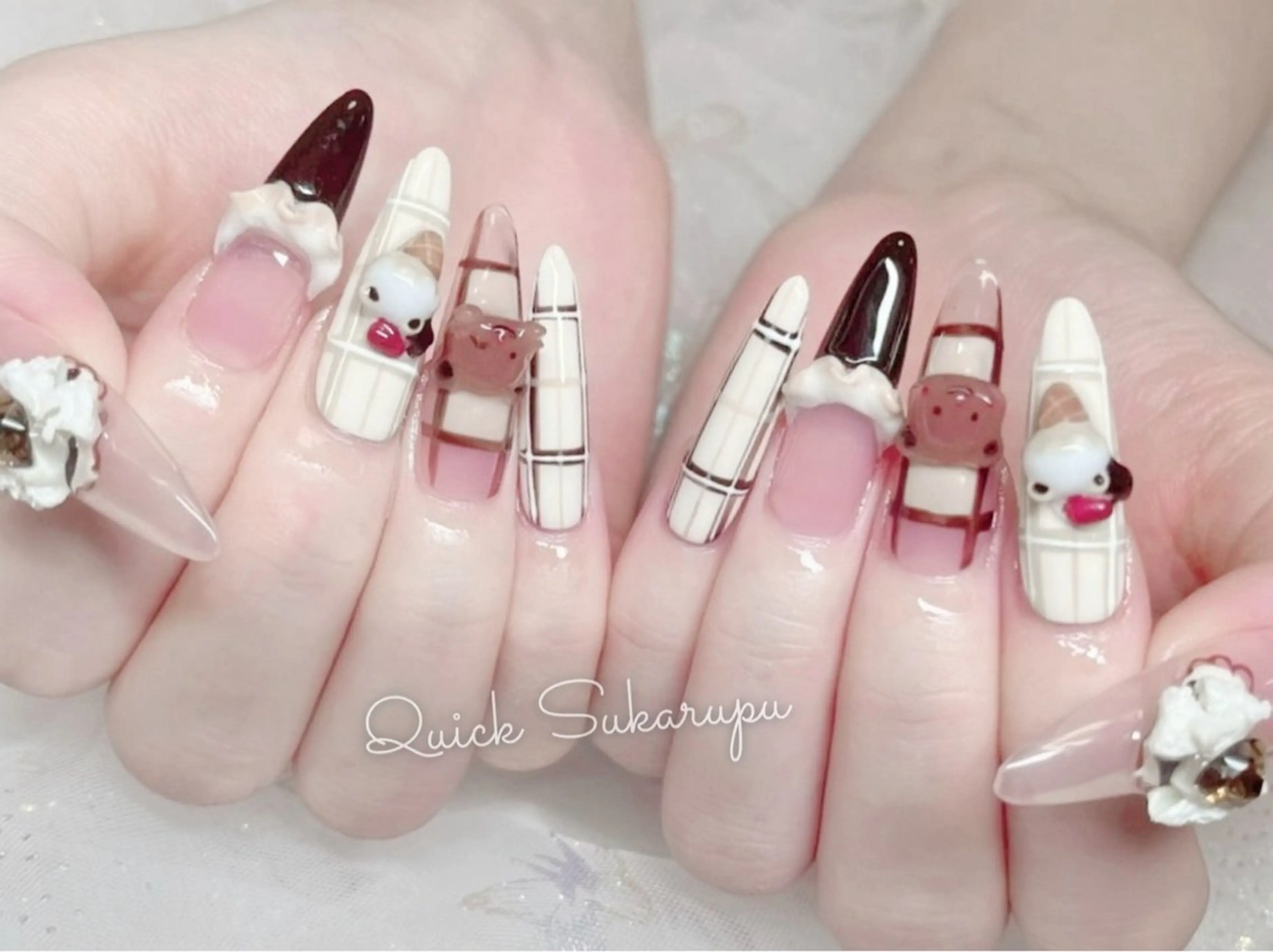 ロング ハンドネイル Quick Sukarupu 高田馬場店所属・Quick Sukarupuのネイルデザイン