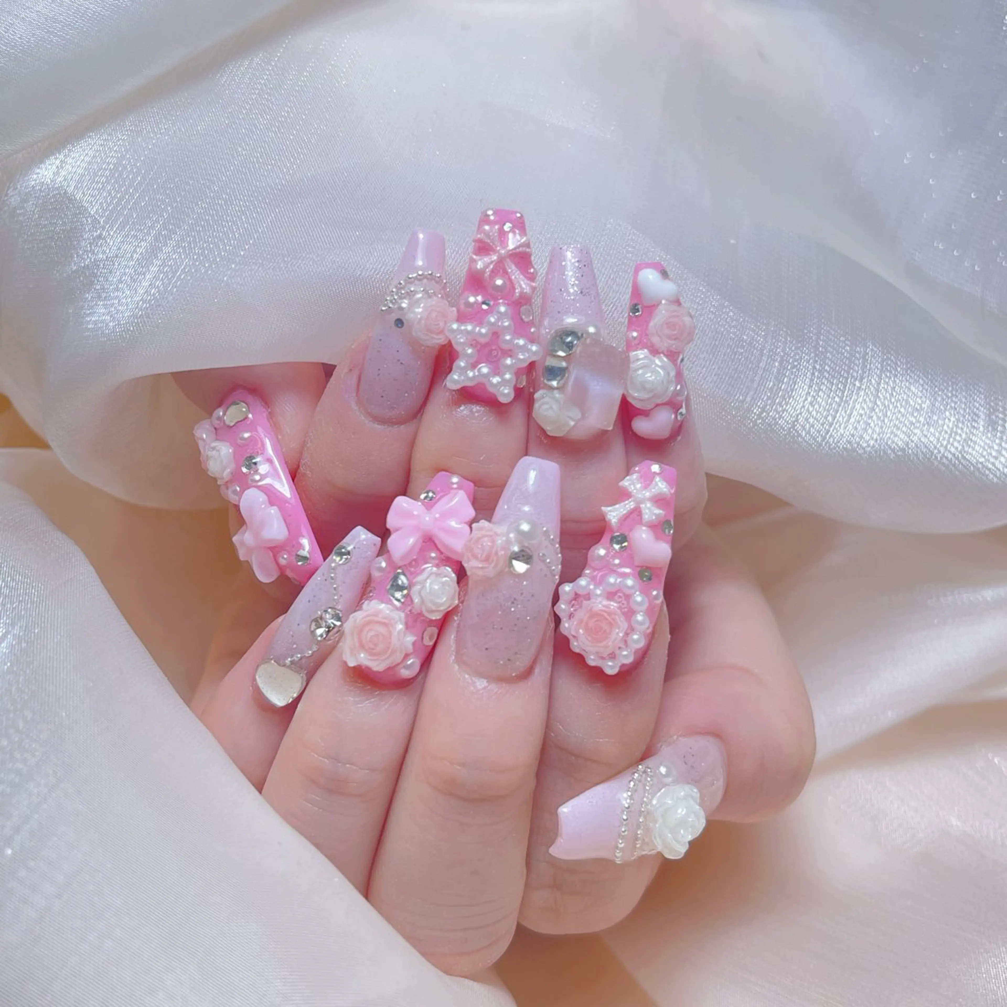 ネイル クリアネイル フラッシュネイル ハート キラキラネイル ロングネイル ハンドネイル princess 木戸　唯のネイルデザイン