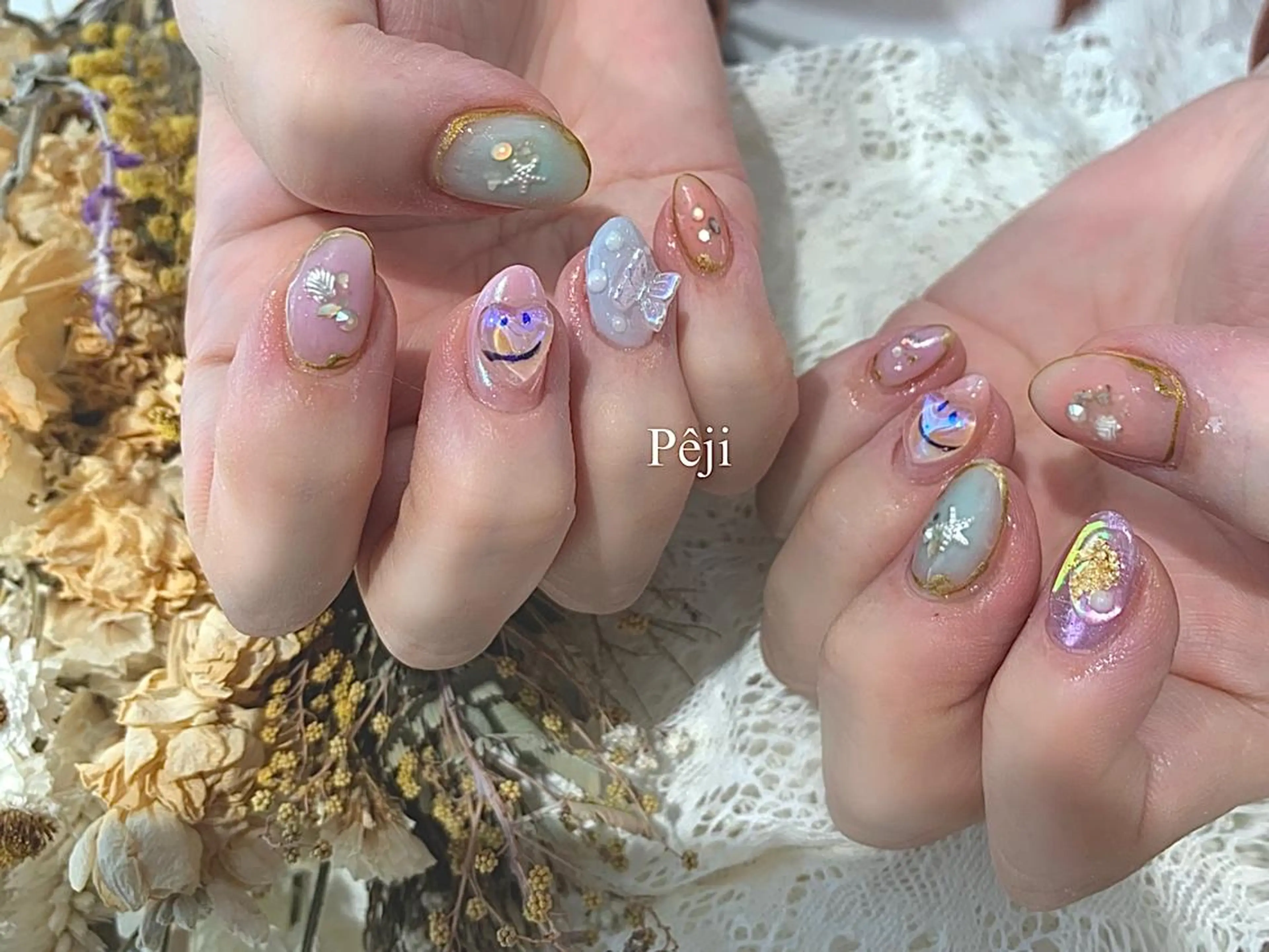 ミディアム m kaori𓃟のネイルデザイン