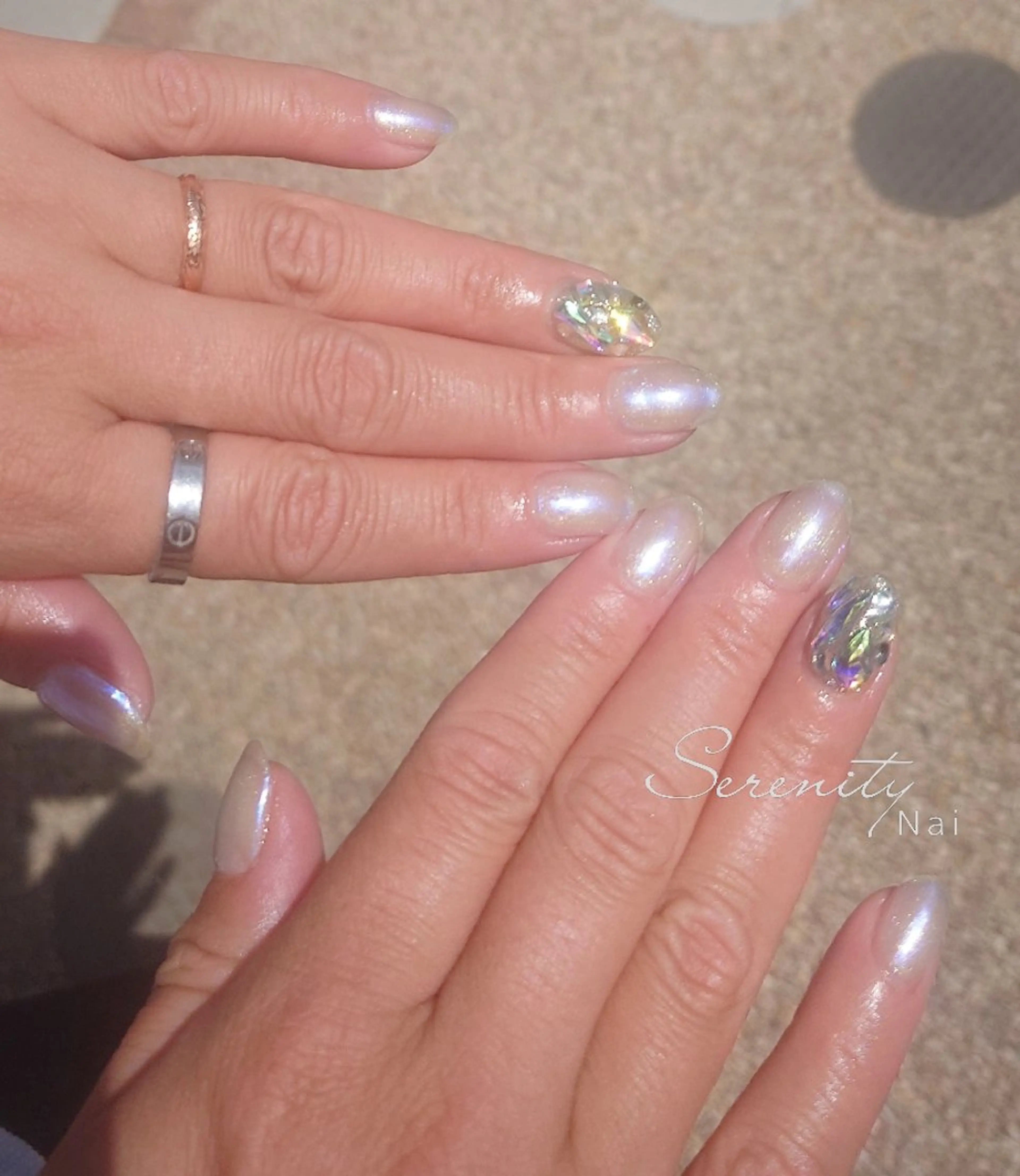 ネイル オーロラネイル ミラーネイル 持ち込み ストーンネイル ブライダルネイル nail  serenityのネイルデザイン