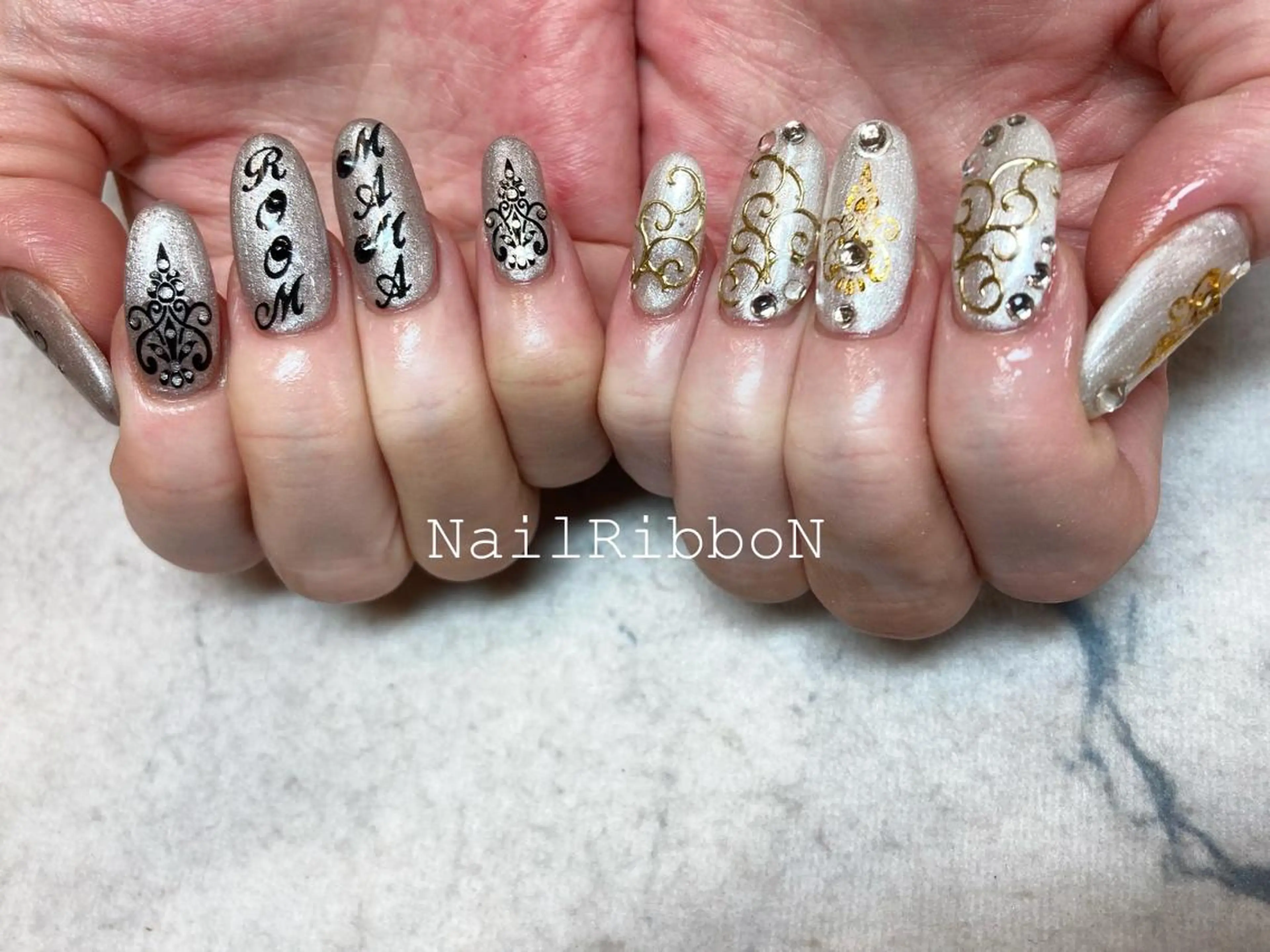 ネイル ネイルリボン 受付スタッフのネイルデザイン