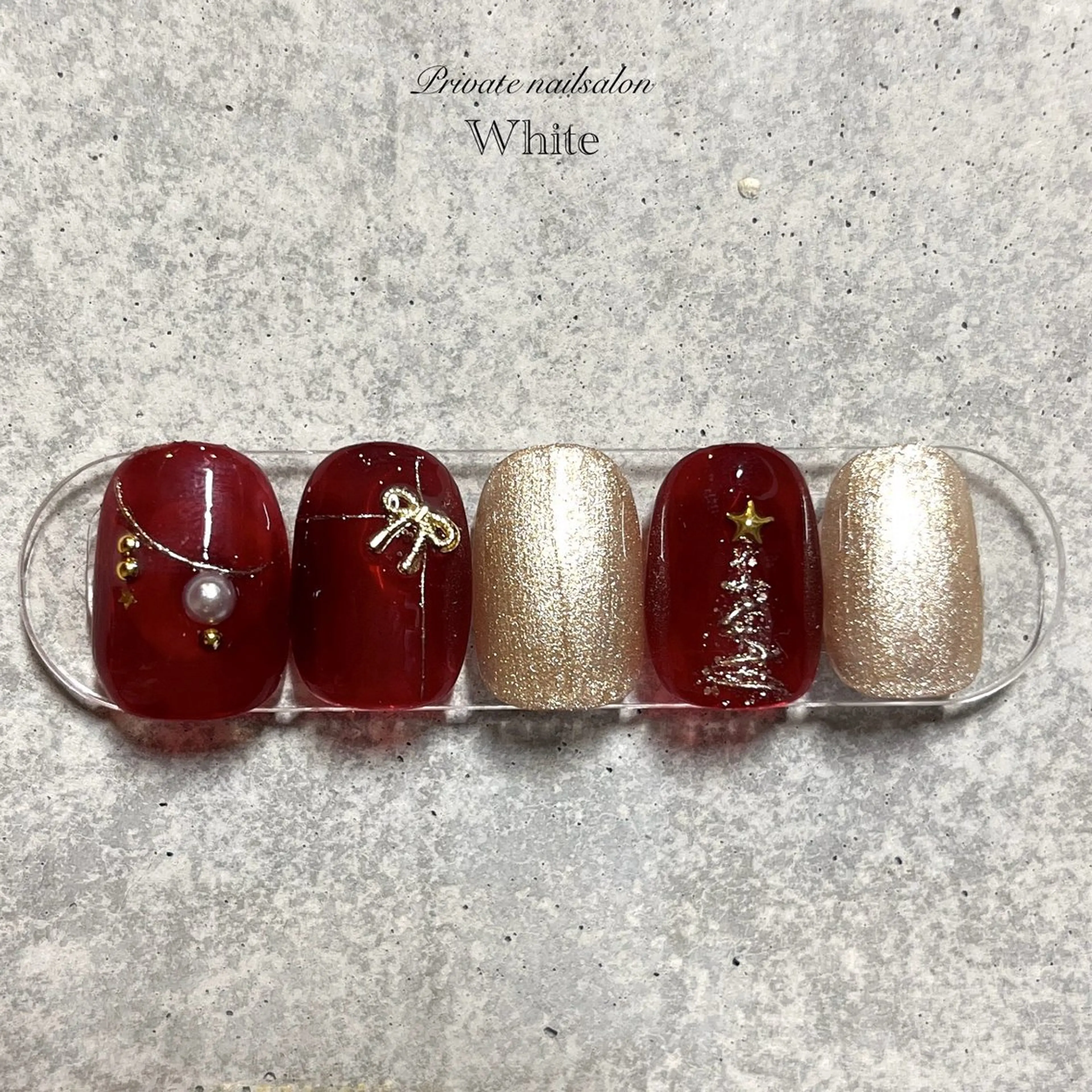 ネイル ボルドー キラキラネイル ニュアンスネイル リボン 冬ネイル ハンドネイル SAKASHITA KEIのネイルデザイン