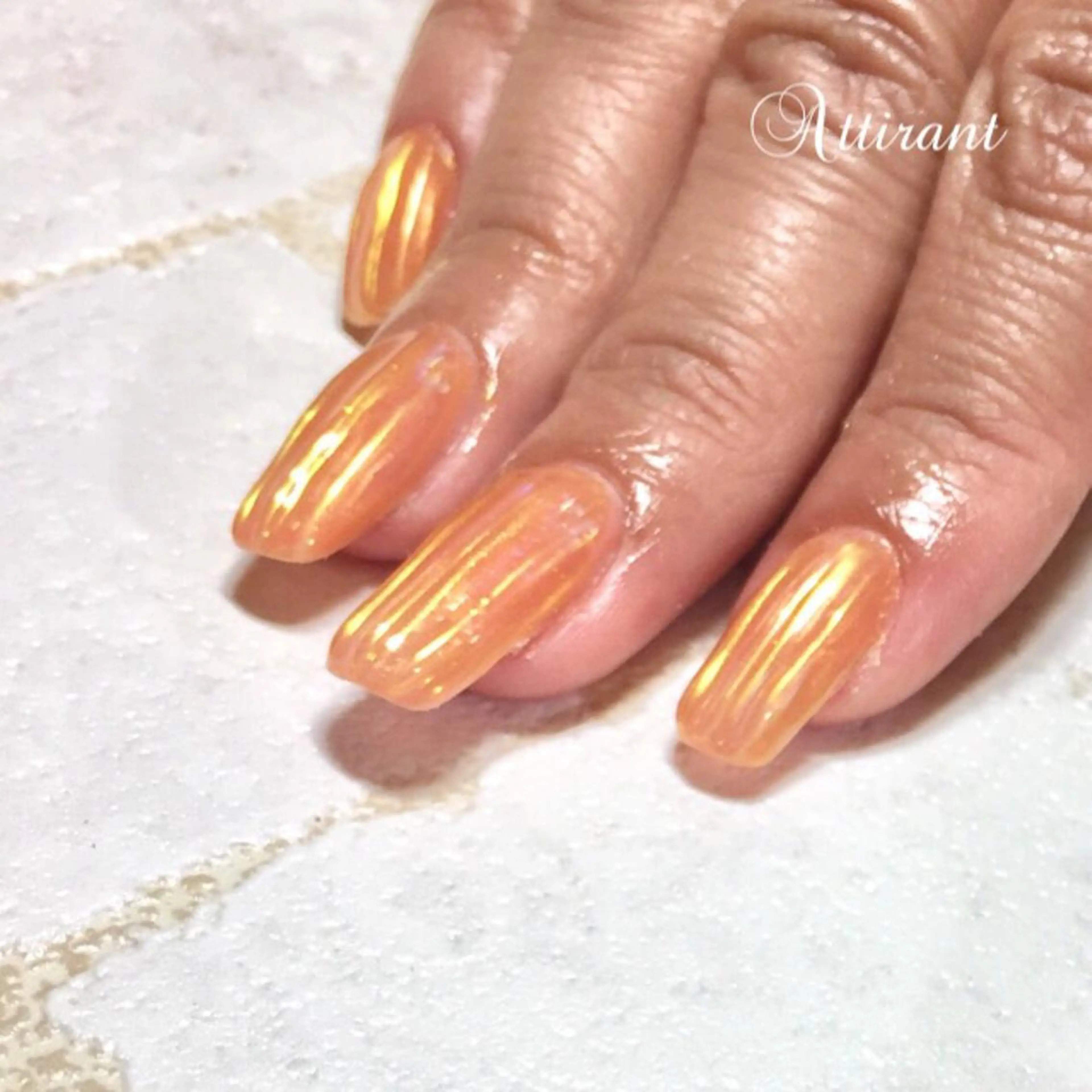 ネイル ゴールド ミラーネイル 黄色 ネイルサロン アティロン所属・ネイルサロン アティロンのネイルデザイン