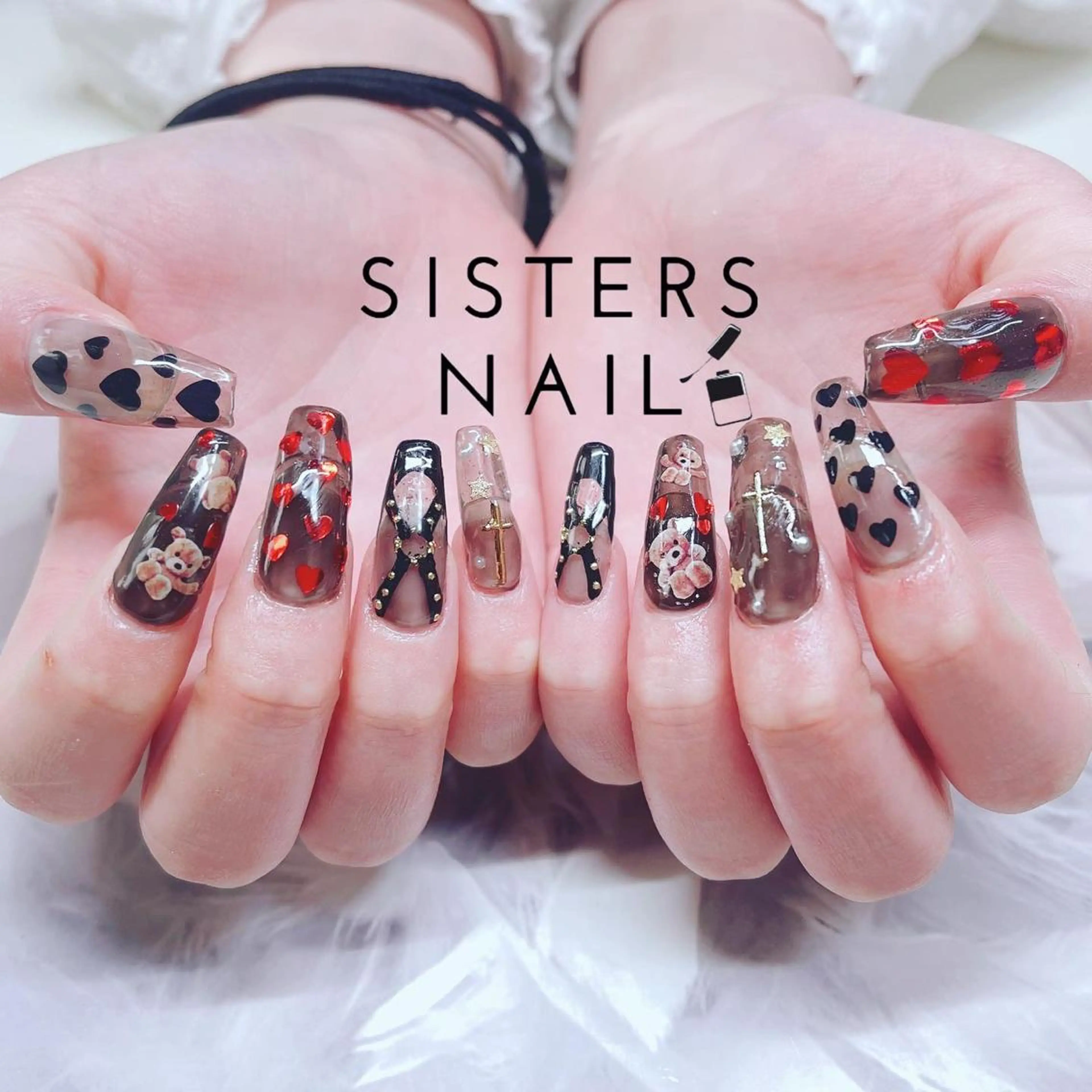 ネイル アートネイル ハート キラキラネイル リボン ハンドネイル ハンドケア sisters nail.fのネイルデザイン