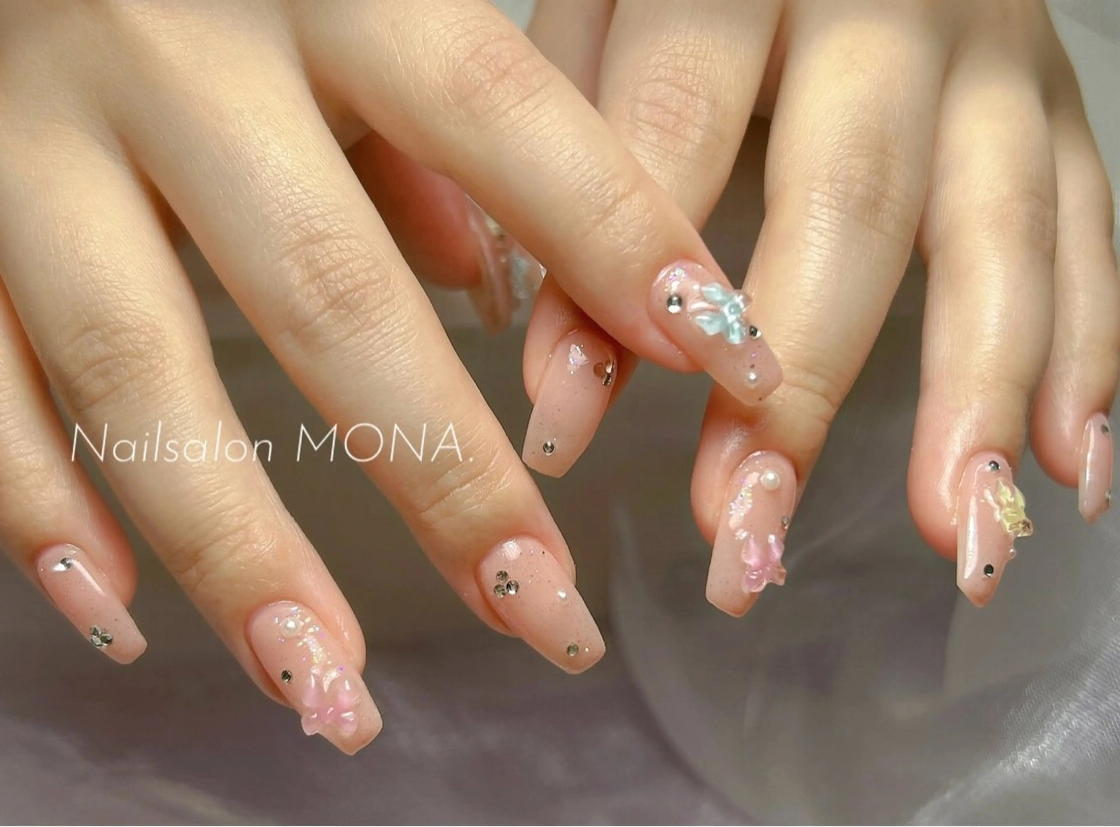 ネイル ピンク リボン ハンドネイル Nailsalon MONA.のネイルデザイン
