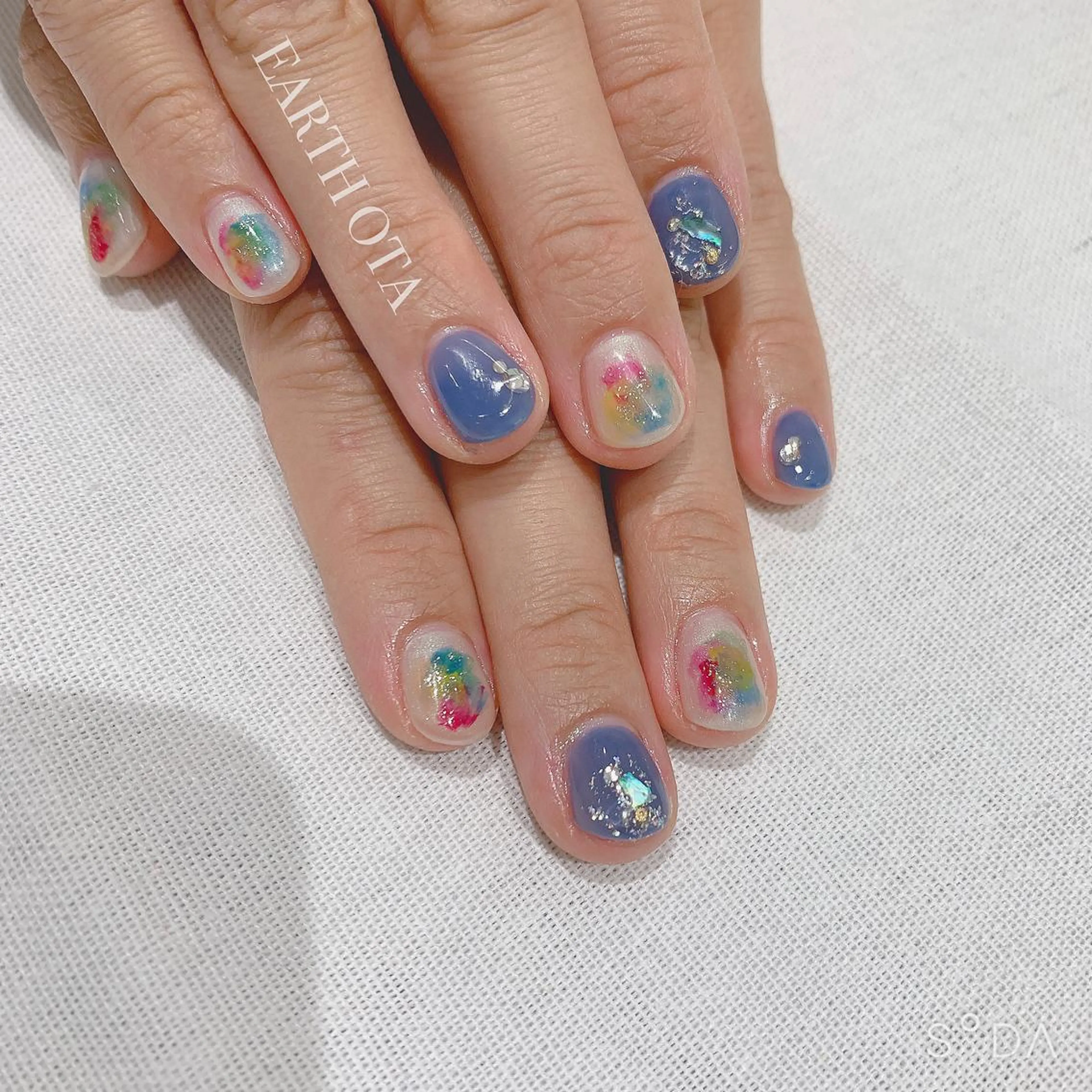 ネイル ブルー クリアネイル 赤色 Rena colore'のネイルデザイン