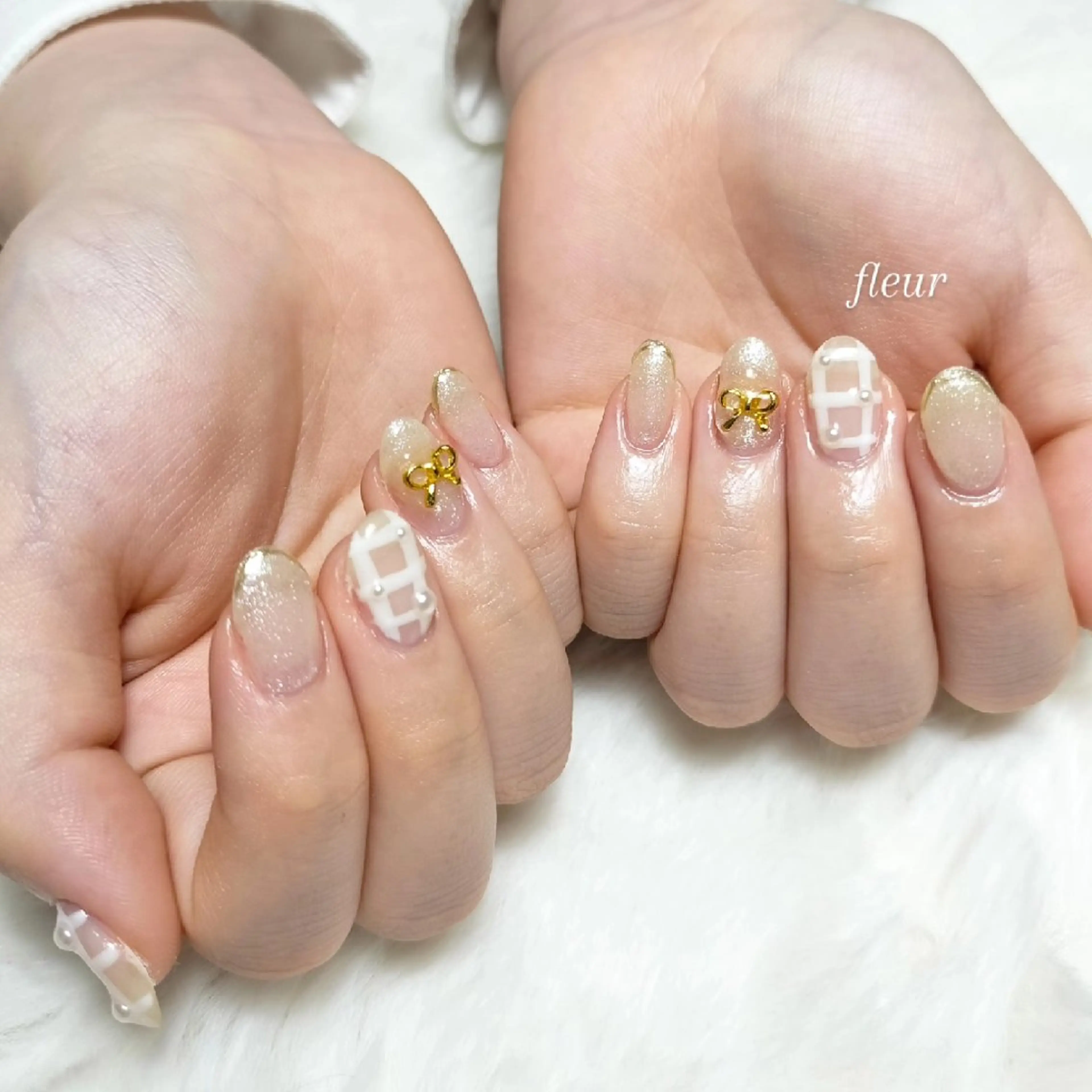 ネイル キラキラネイル リボン megumi. sのネイルデザイン