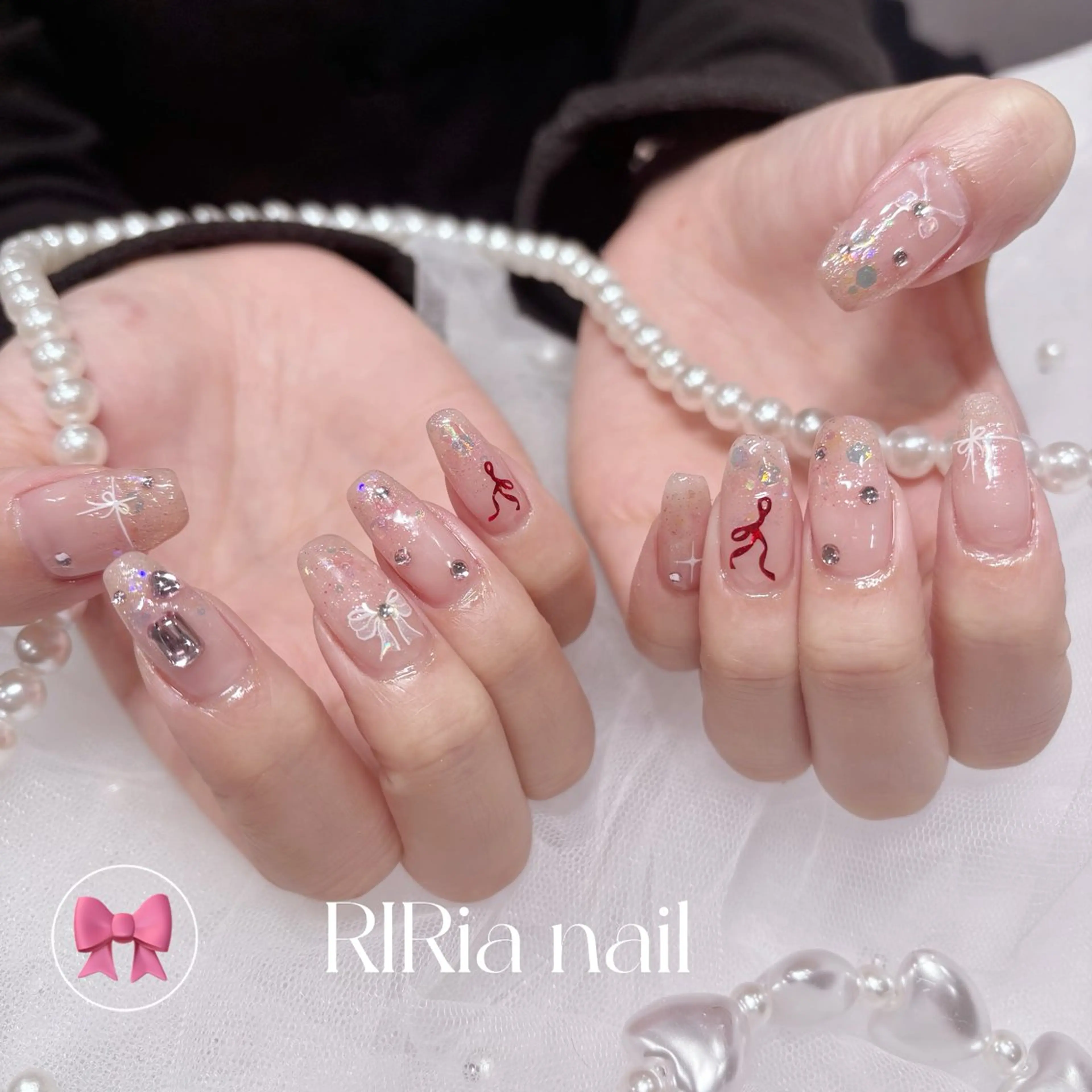 ネイル ガーリー キラキラネイル ラメ(グリッター) 赤色 リボン ハンドネイル 🎀『RlRia』（GO TODAY シェアサロン 横浜Solace店内）🎀所属・RlRia .のネイルデザイン