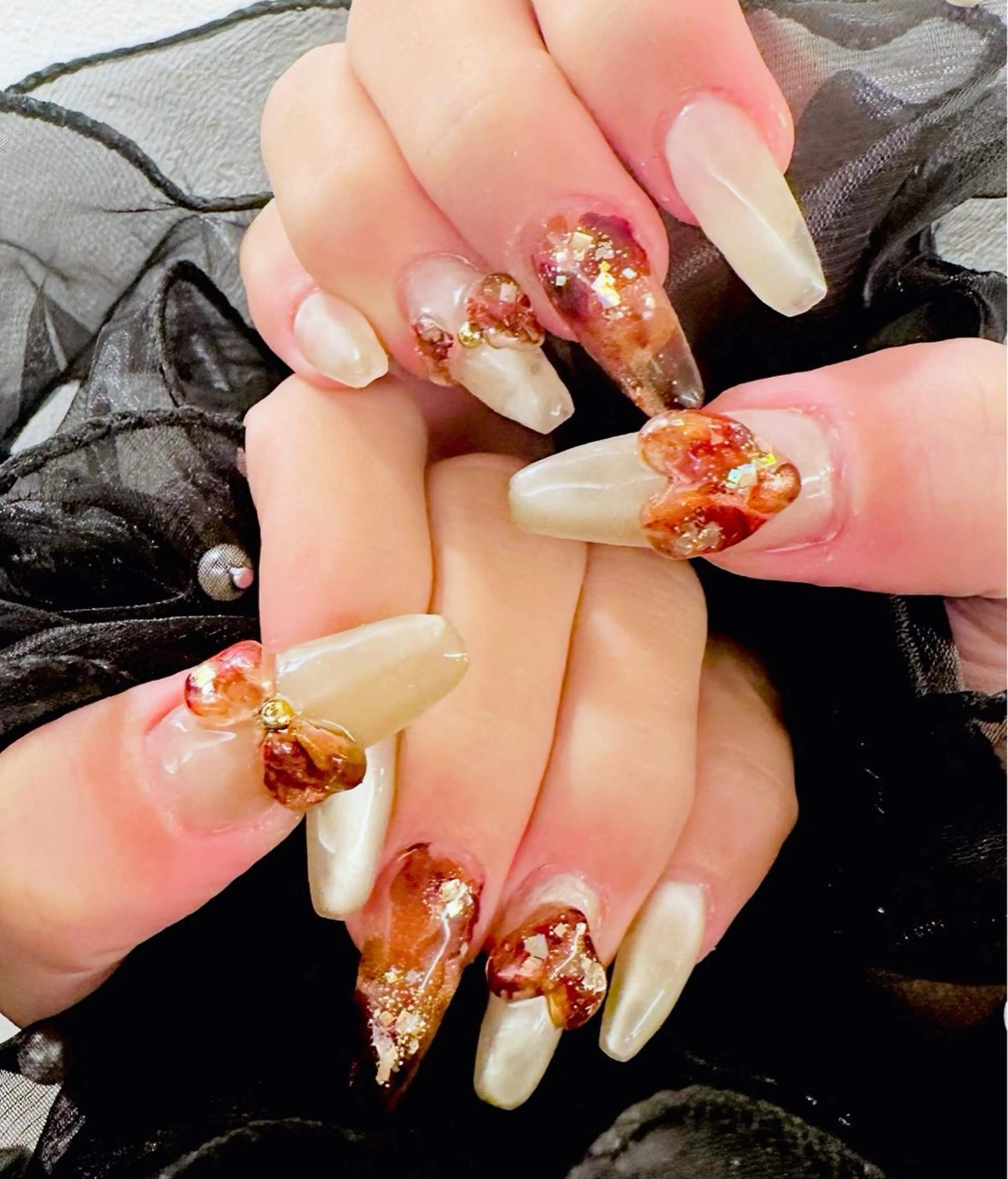 ネイル べっ甲ネイル ハート ラメ(グリッター) リボン ハンドネイル ネイルサロンエレノア所属・田端 笑理菜のネイルデザイン