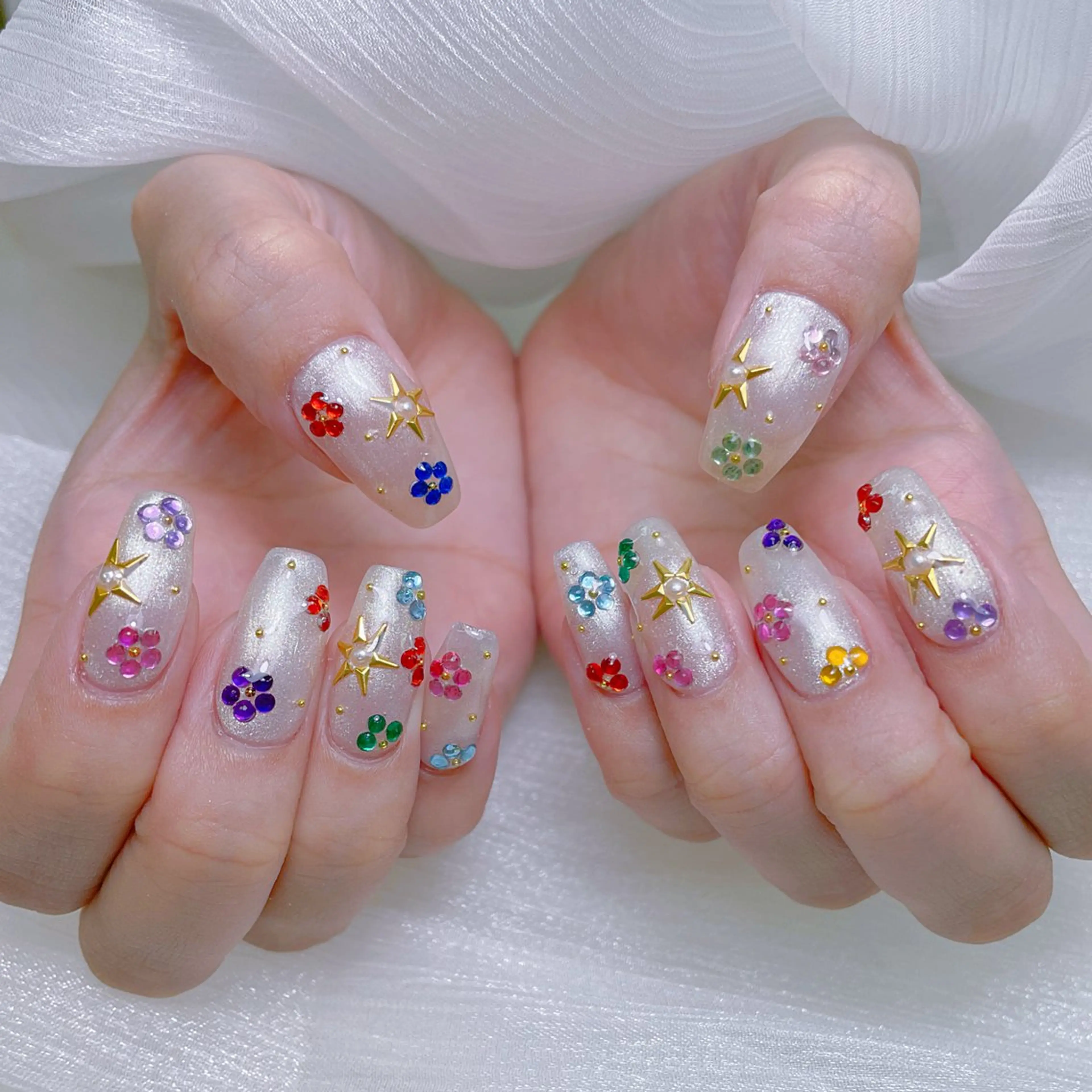 ネイル クリアネイル フラワーネイル キラキラネイル ロングネイル マグネットネイル ハンドネイル princess 木戸　唯のネイルデザイン