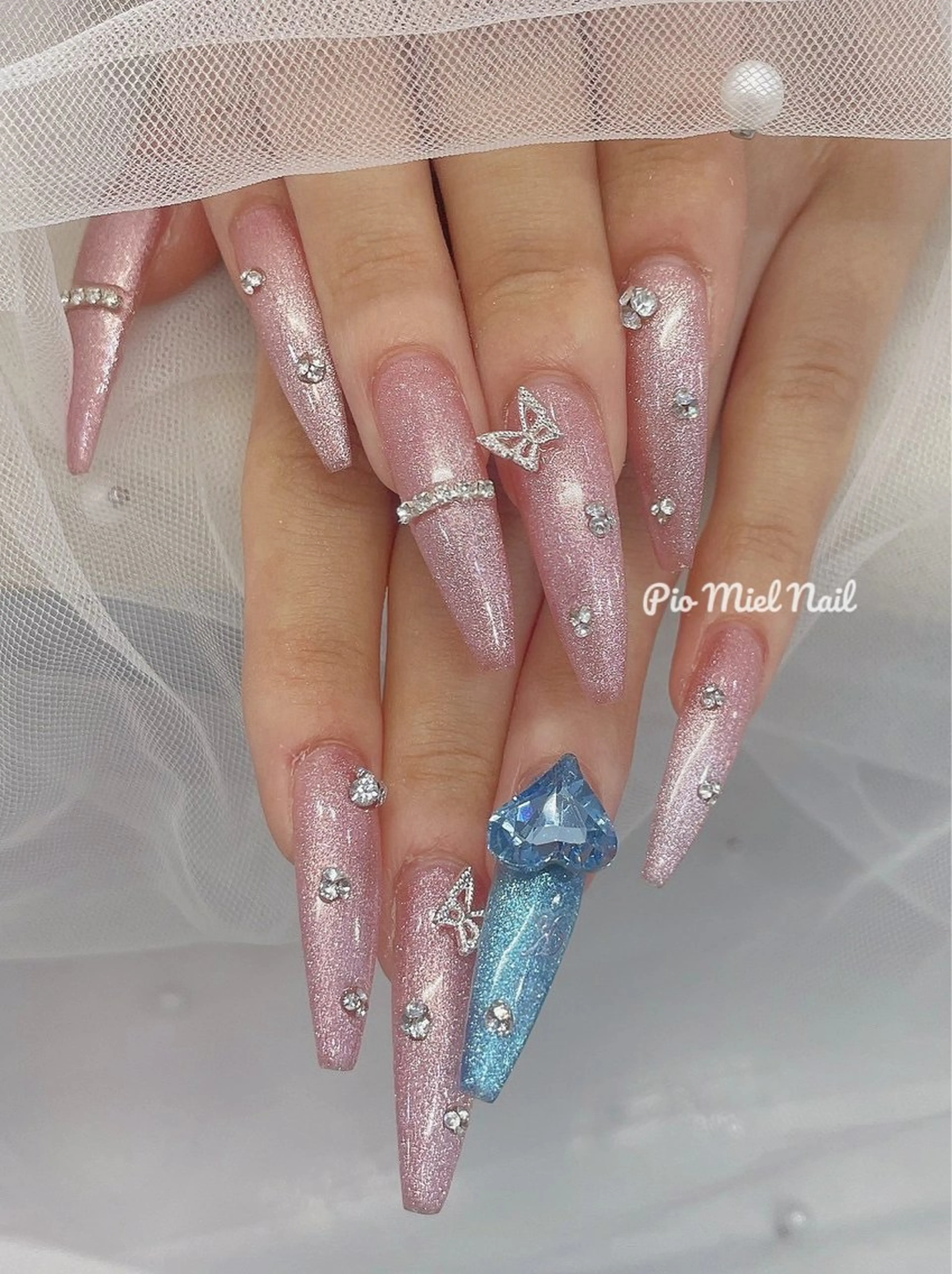 ロング ハンドネイル ハンドケア Pio Mielのネイルデザイン