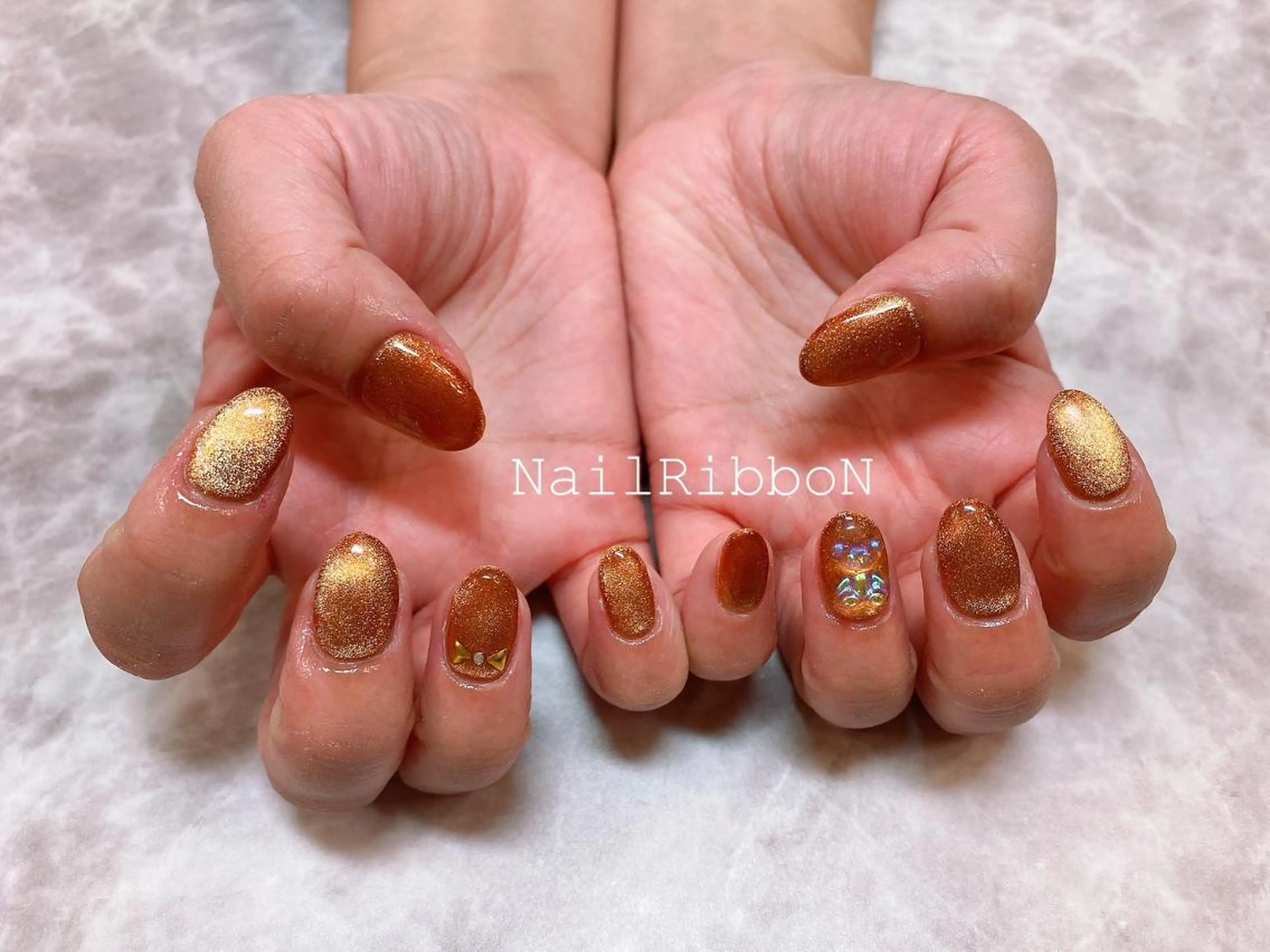ネイル ネイルリボン 受付スタッフのネイルデザイン