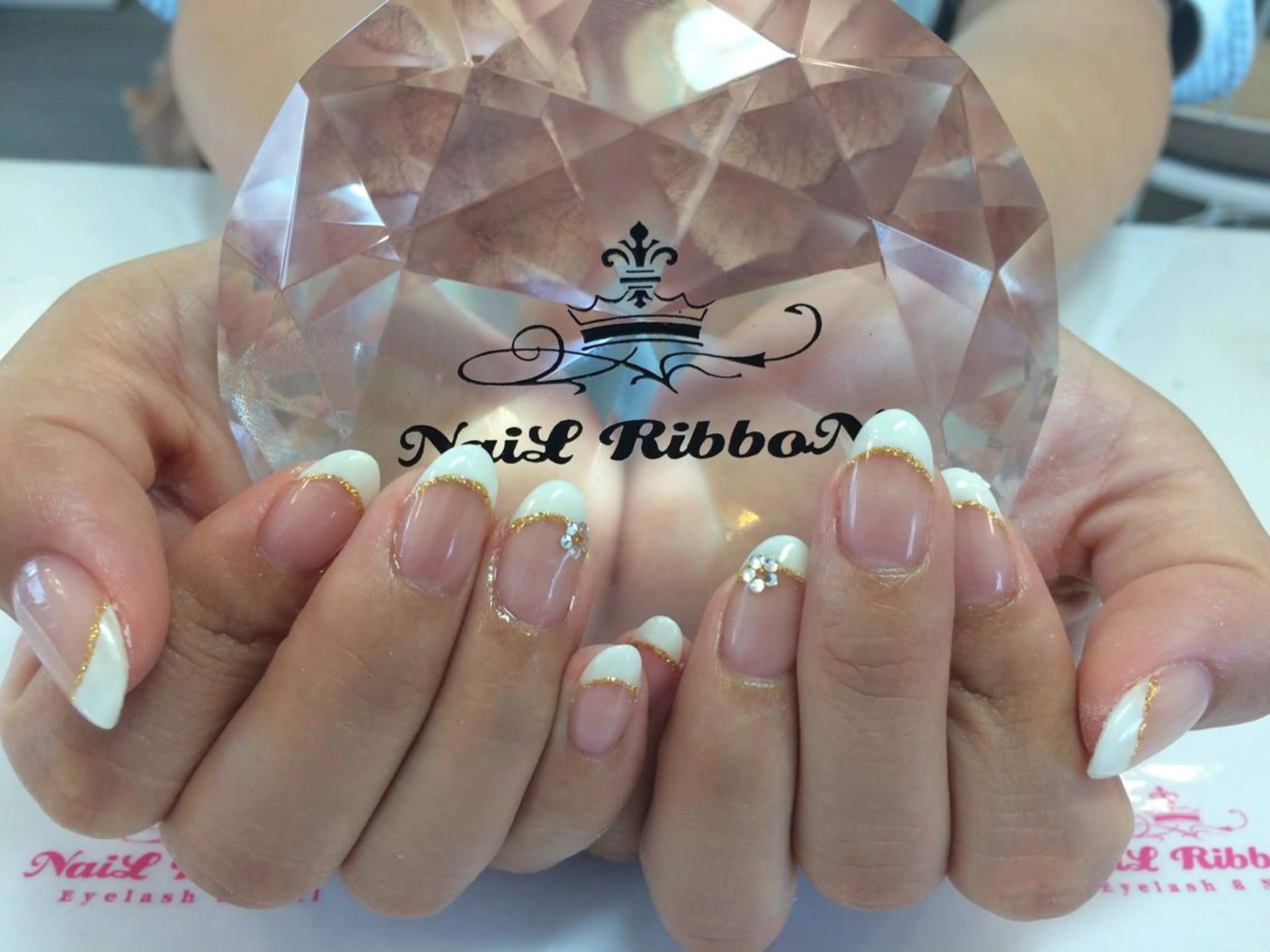 ネイル ネイルリボン 受付スタッフのネイルデザイン