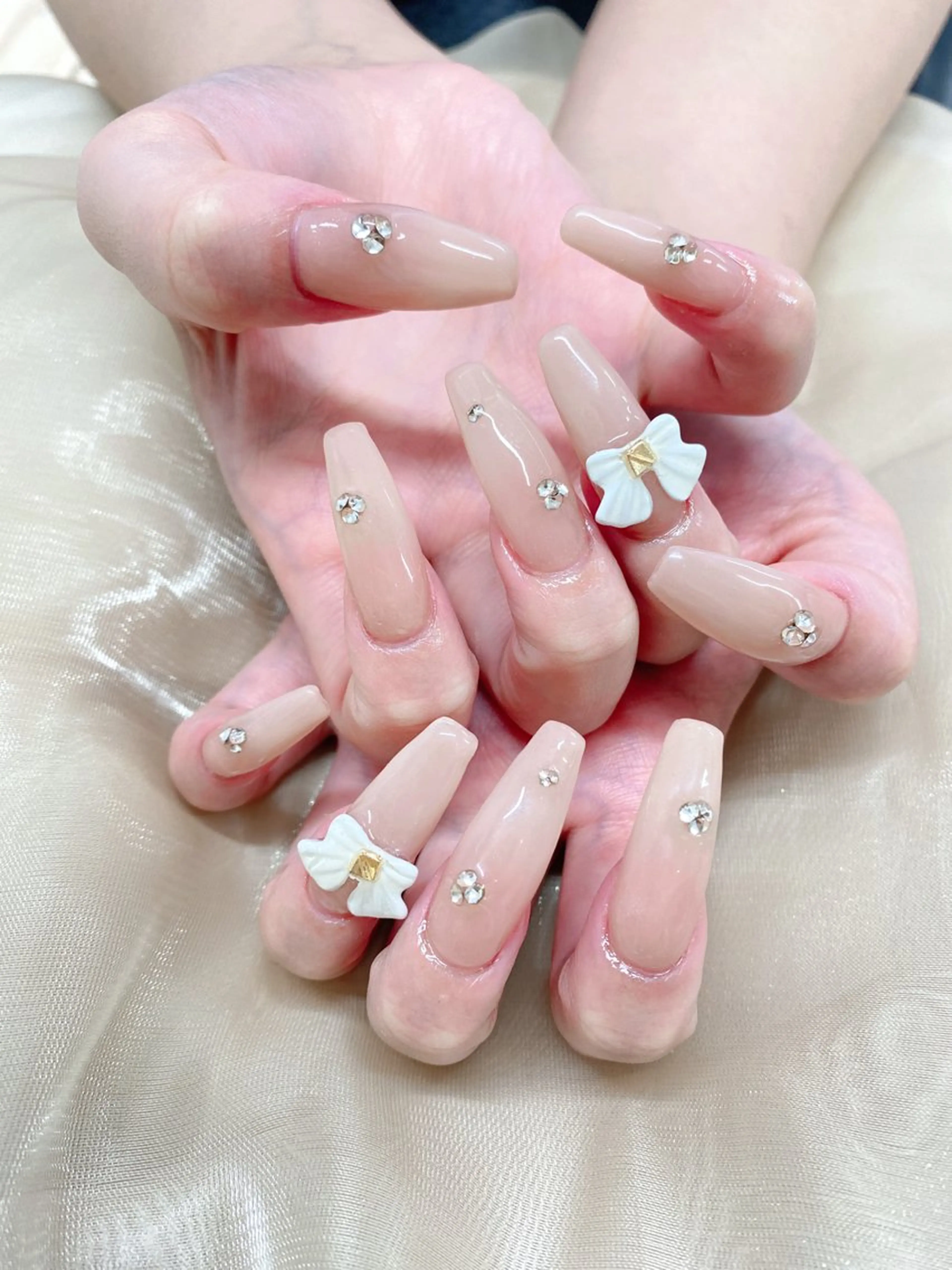 ネイル アートネイル リボン ハンドネイル Moci Nail Salonのネイルデザイン