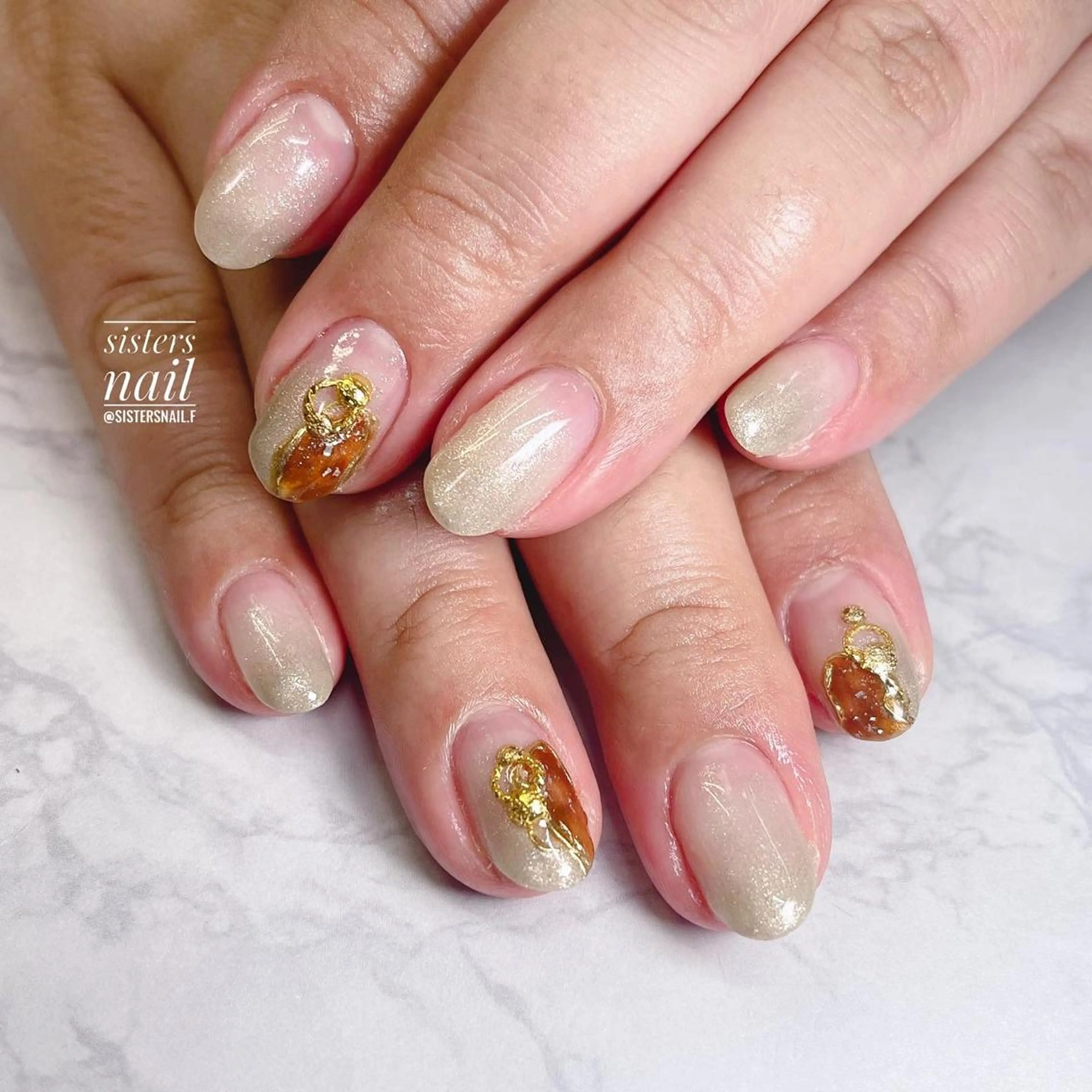 ネイル アートネイル べっ甲ネイル グラデーション キラキラネイル ニュアンスネイル sisters nail.fのネイルデザイン