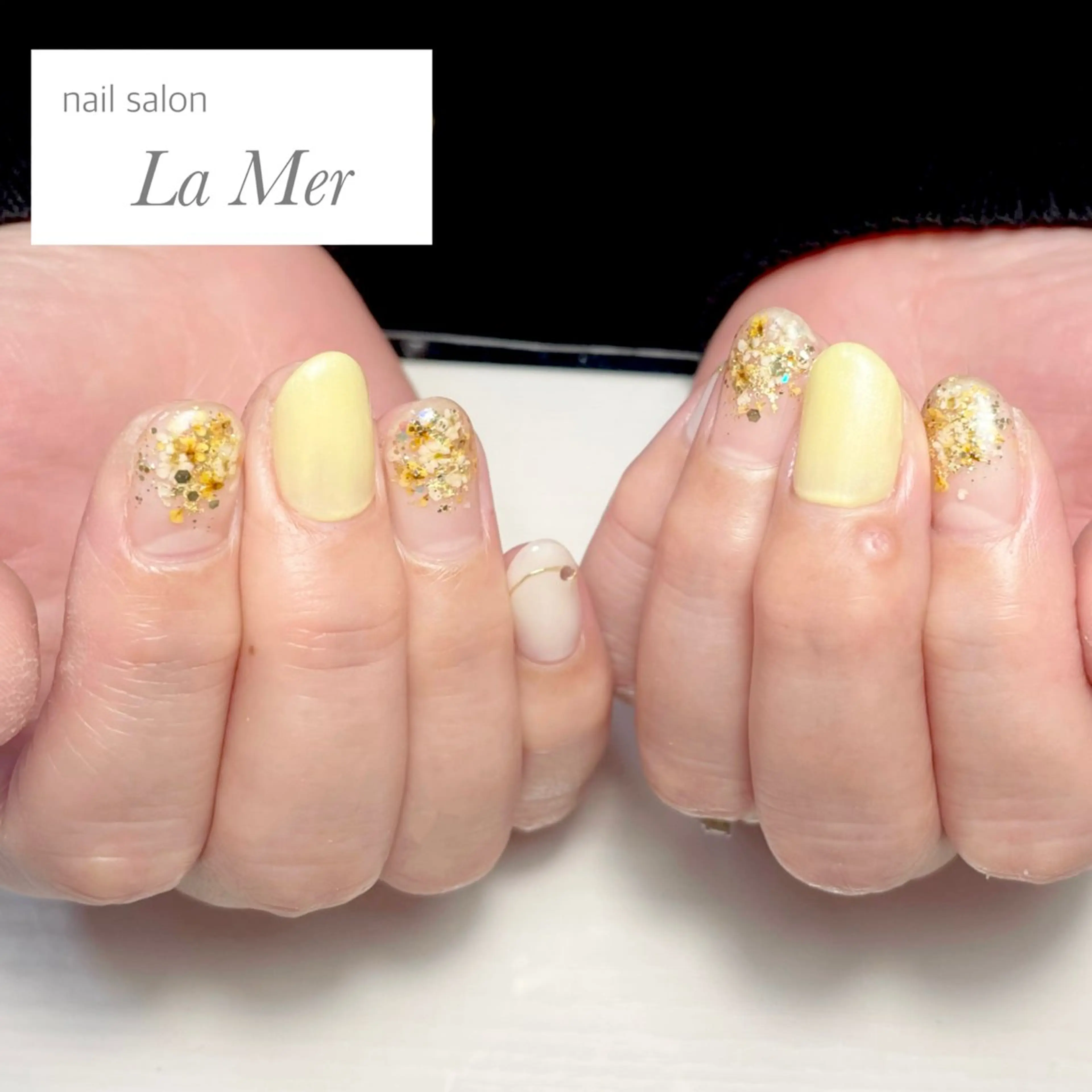 ネイル フラワーネイル オフィスネイル 春ネイル 黄色 ハンドネイル nailsalon La Merのネイルデザイン